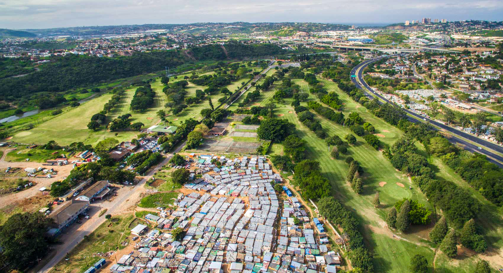 golf course next to shacks in durban