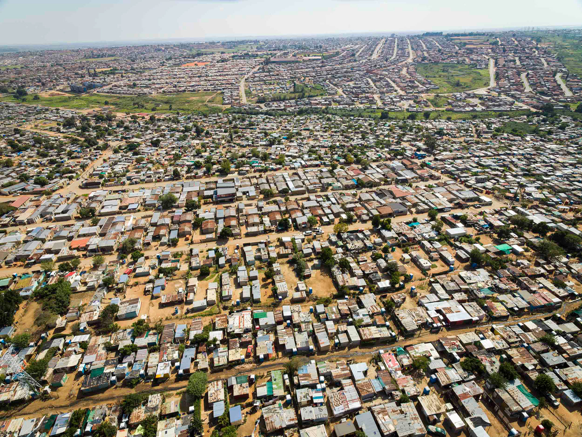 aerial view of houses and shacks in johannesburg, south africa