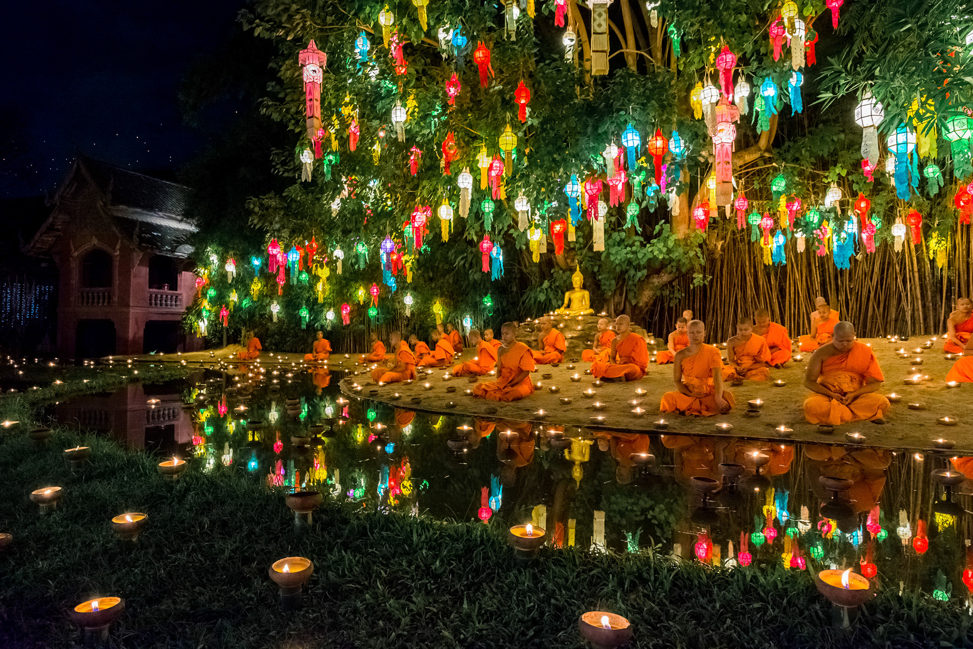 Novice monks meditating at Wat Phan Tao during Loy Krathong / Yi Peng Festival: Chiang Mai