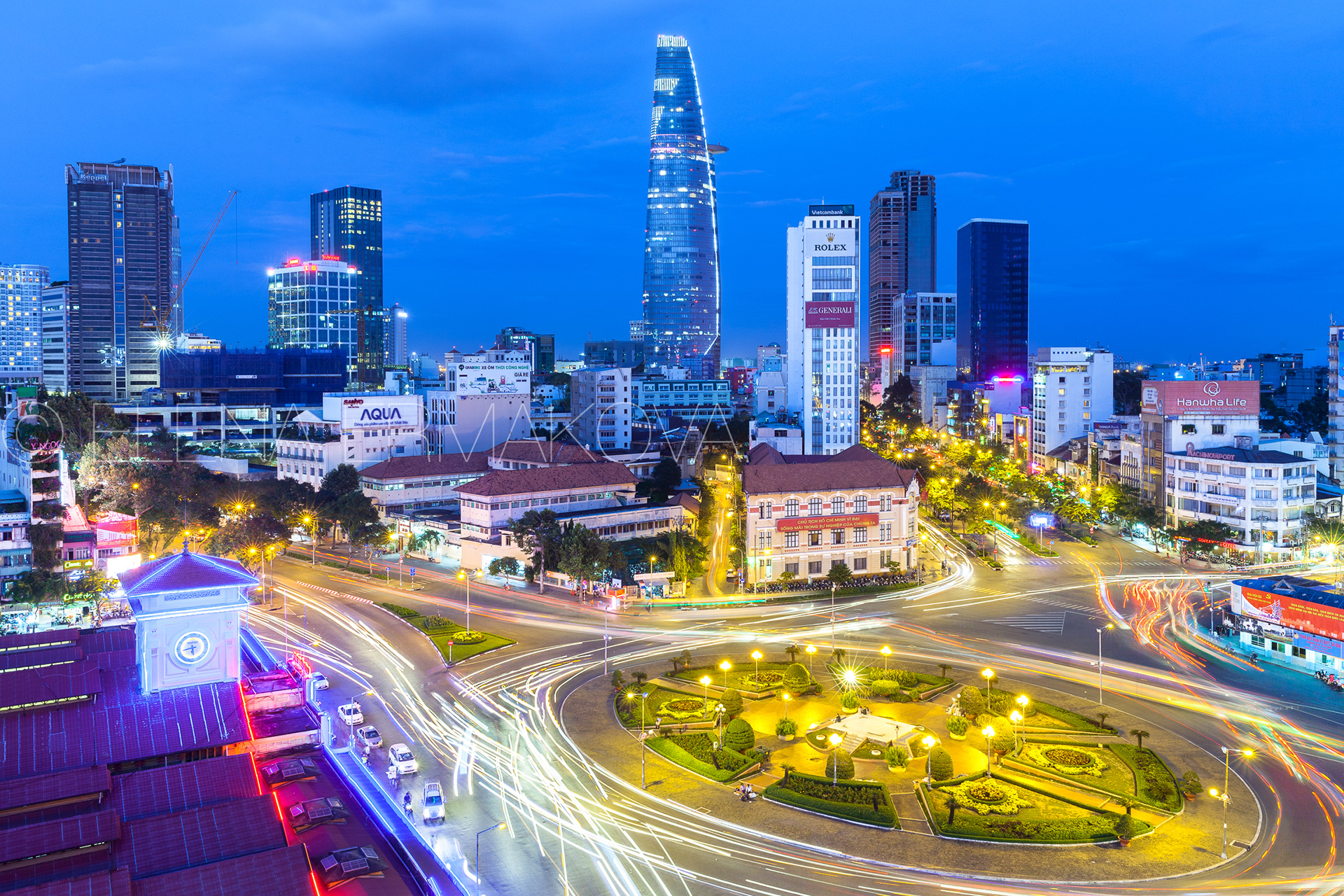 Ho Chi Minh City skyline at dusk with Bitexco Financial Tower on the background, Ben Thanh Market area, Vietnam