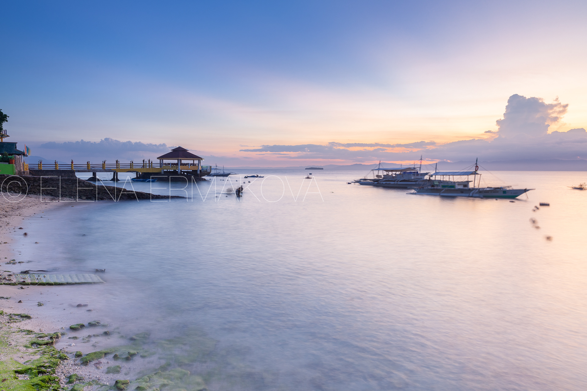 Sunset view of the Moalboal beach famous diving and snorkeling spot in Cebu, Philippines