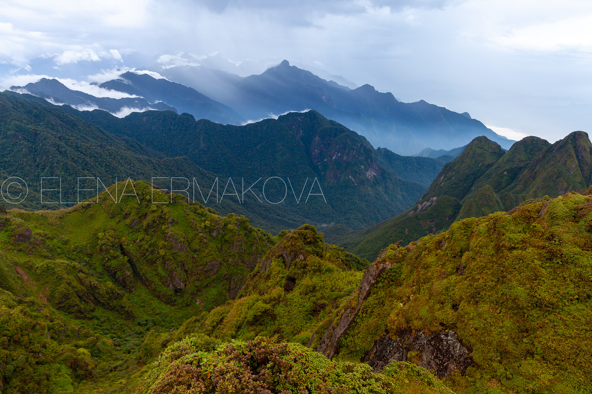 Stunning view of the mountain range from the highest peak of Vietnam the Fansipan mountain, Sapa, Vietnam