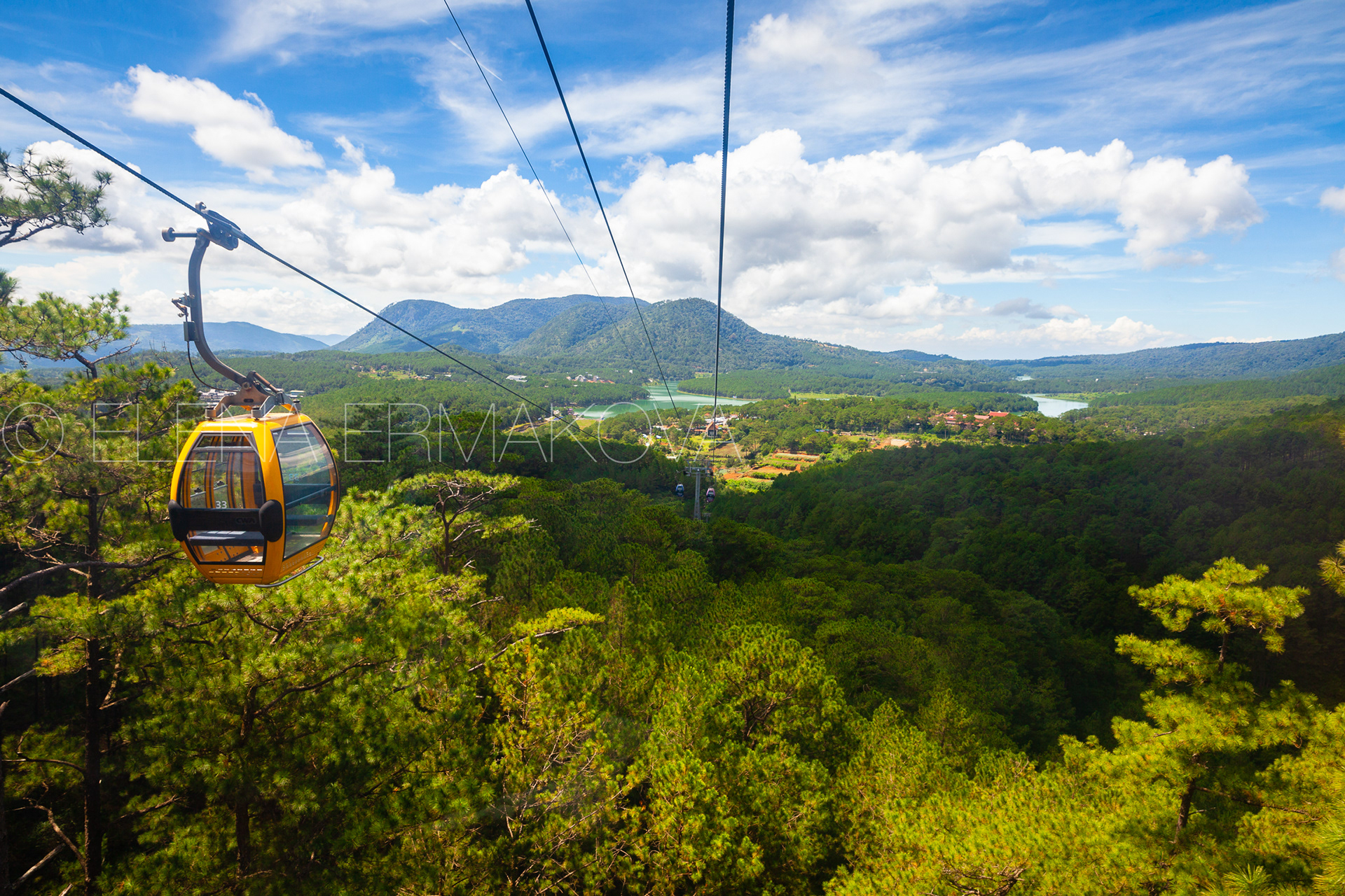 Panorama over mountains and the Truc Lam lake seen from cable car, Dalat, Vietnam