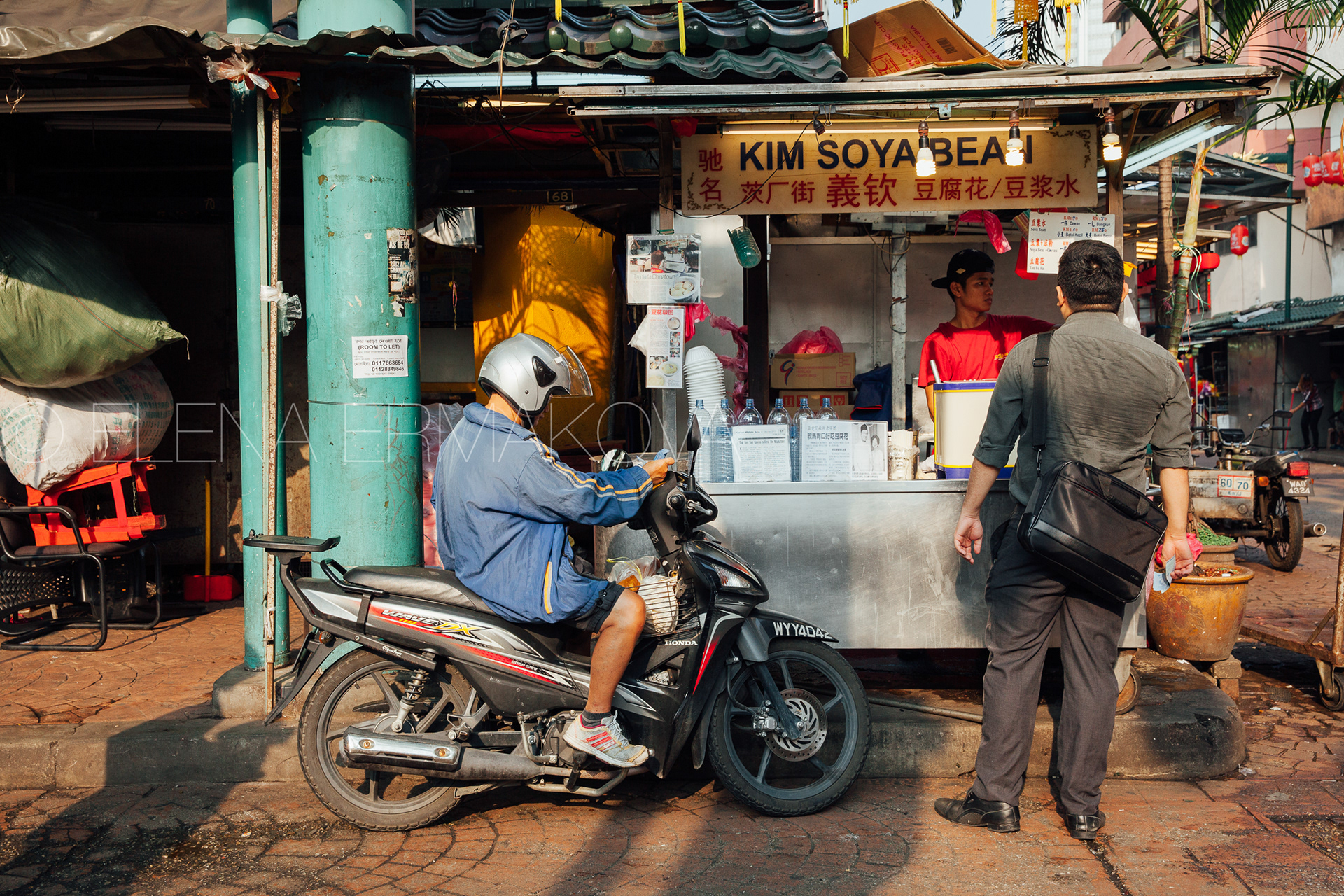 People bying food from popular soya stall at Petaling Street in Chinatown, Kuala Lumpur, Malaysia