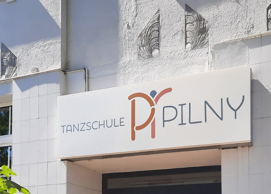 Firmenschild Eingang