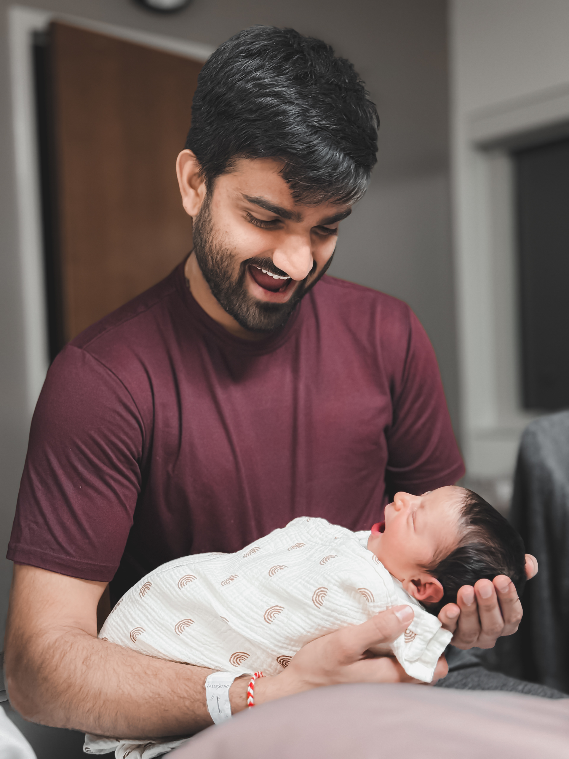 Newborn and her father