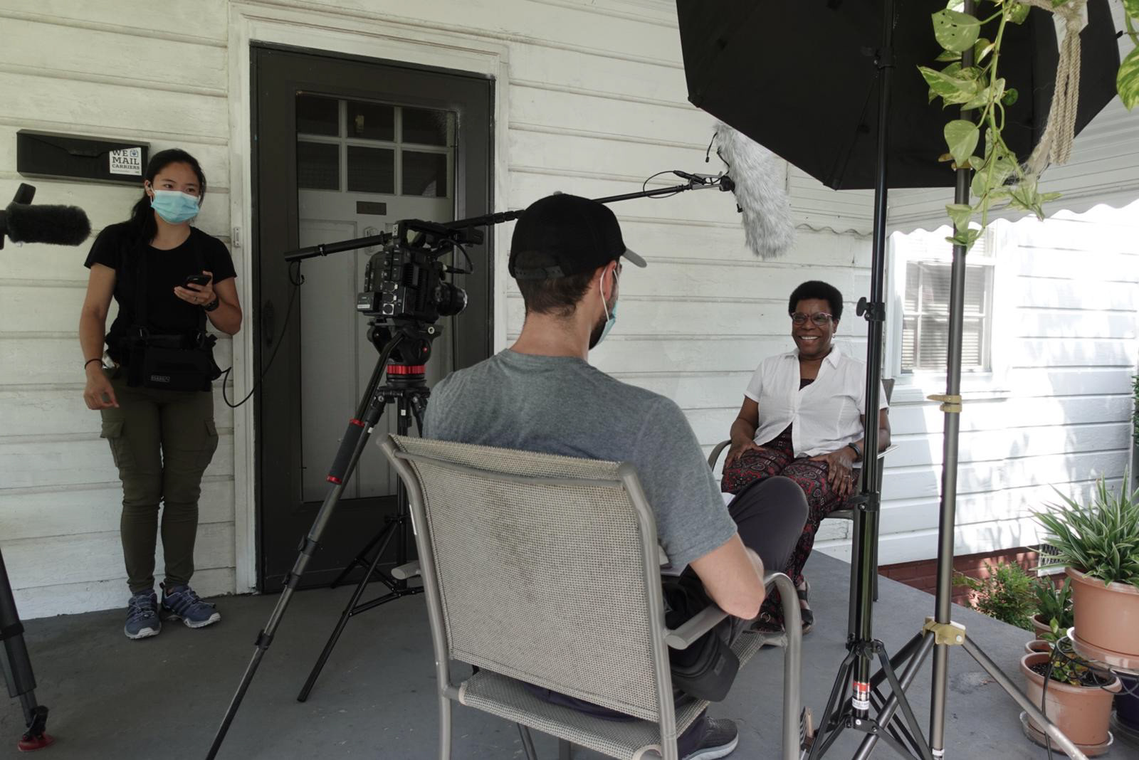 Michael Alfuso, Hannah Park and Johnathan Park filming with Sherri White-Williamson