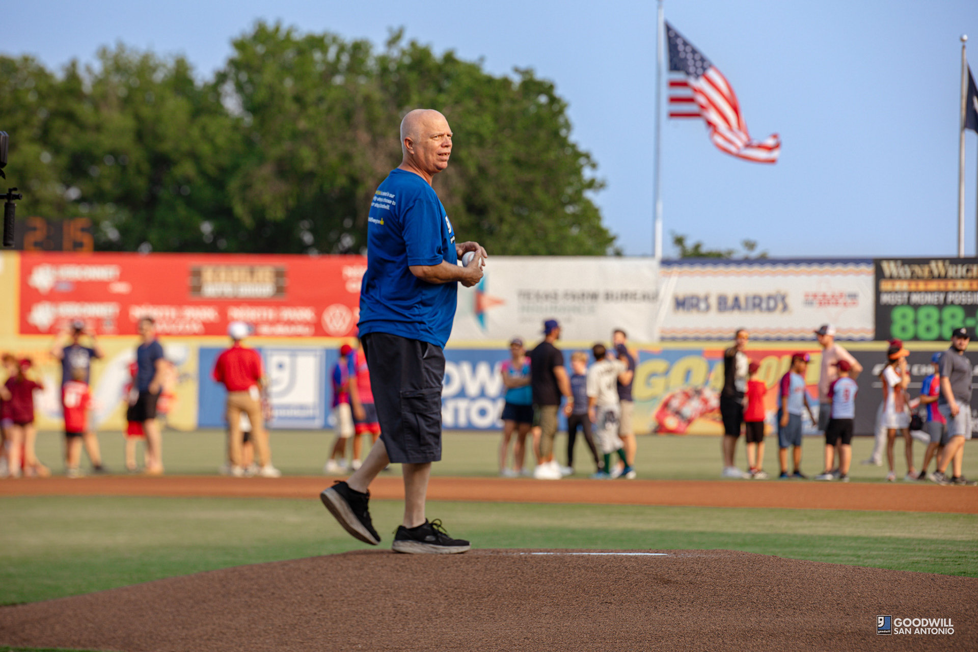 Goodwill San Antonio's longest tenured team member throwing the first pitch at SA Missions game - Photo taken by Vanessa Mallari