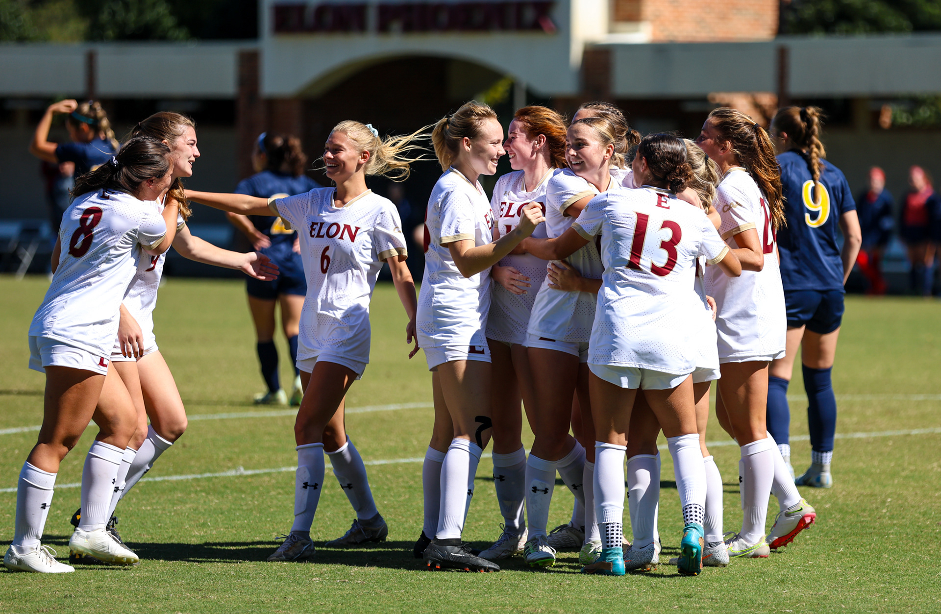 Senior Katie Lowe celebrates with her teammates after assisting on Ashlee Brehio’s goal against Drexel on Senior Day at Rudd Field on Oct. 8, 2023. Photo by Jacob Kisamore.