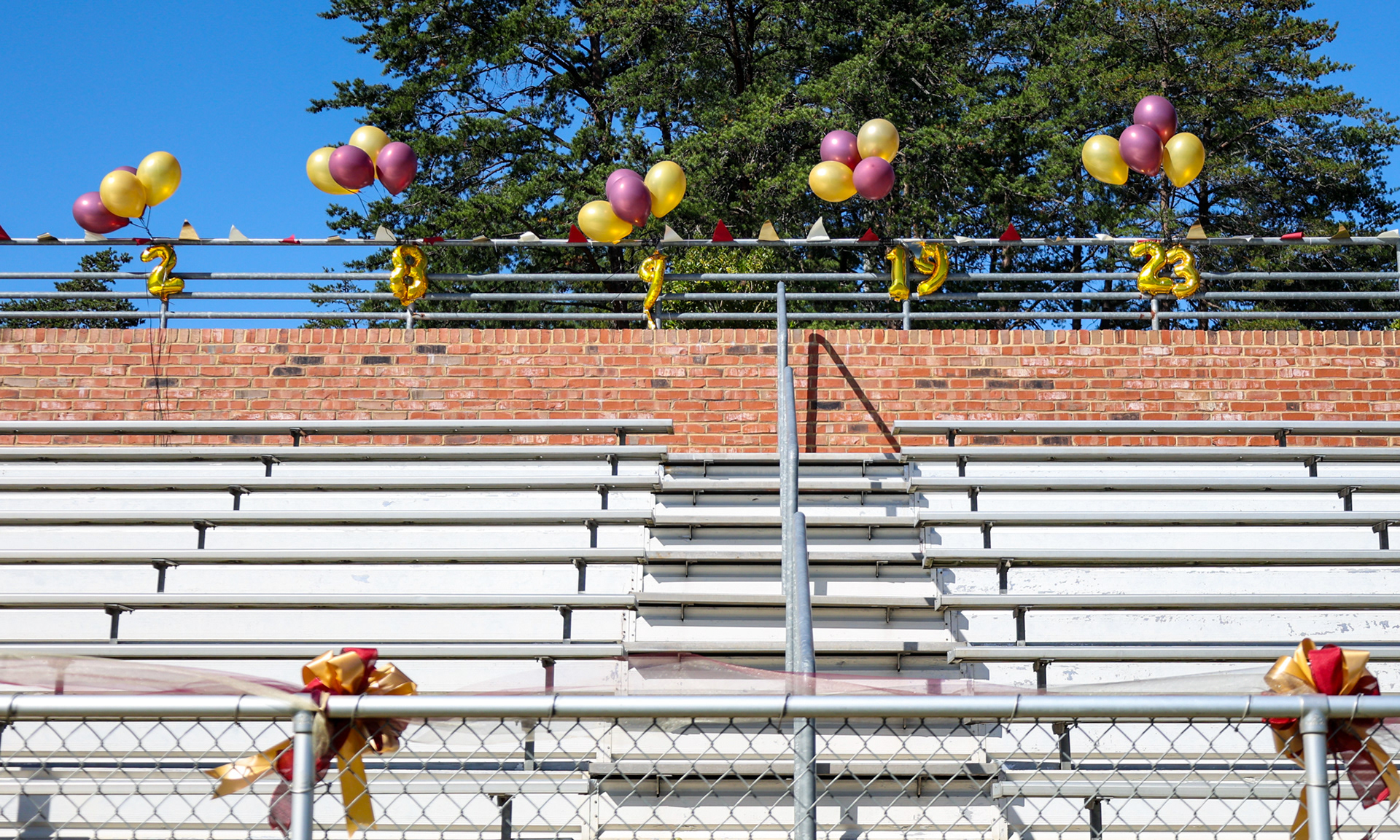 Numbered balloons for all five Elon seniors on Senior Day at Rudd Field on Oct. 8, 2023. Photo by Jacob Kisamore.