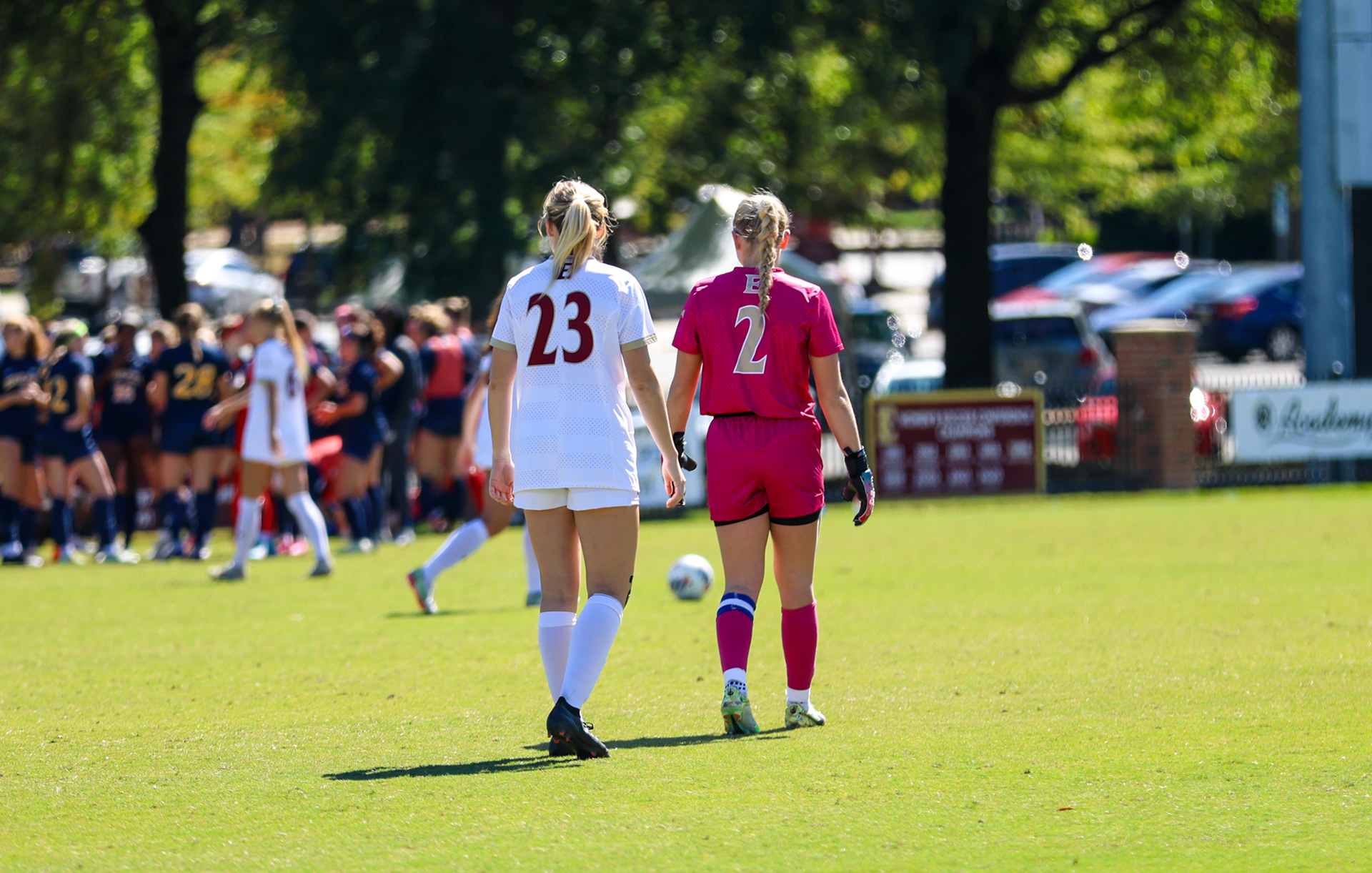 Senior defender Kerri Coffman walks with senior goalkeeper McKenna Dalfonso during a stoppage of play on Senior Day at Rudd Field on Oct. 8, 2023. Photo by Jacob Kisamore.