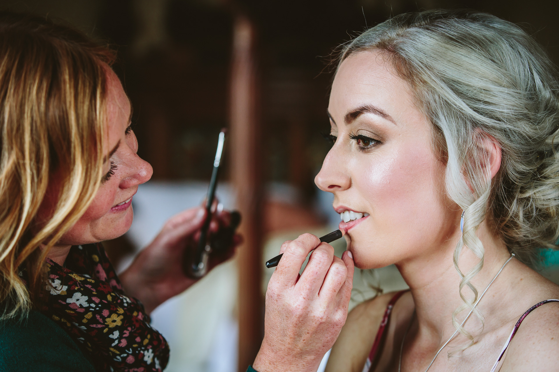 A bride having her make up applied in Yorkshire, England