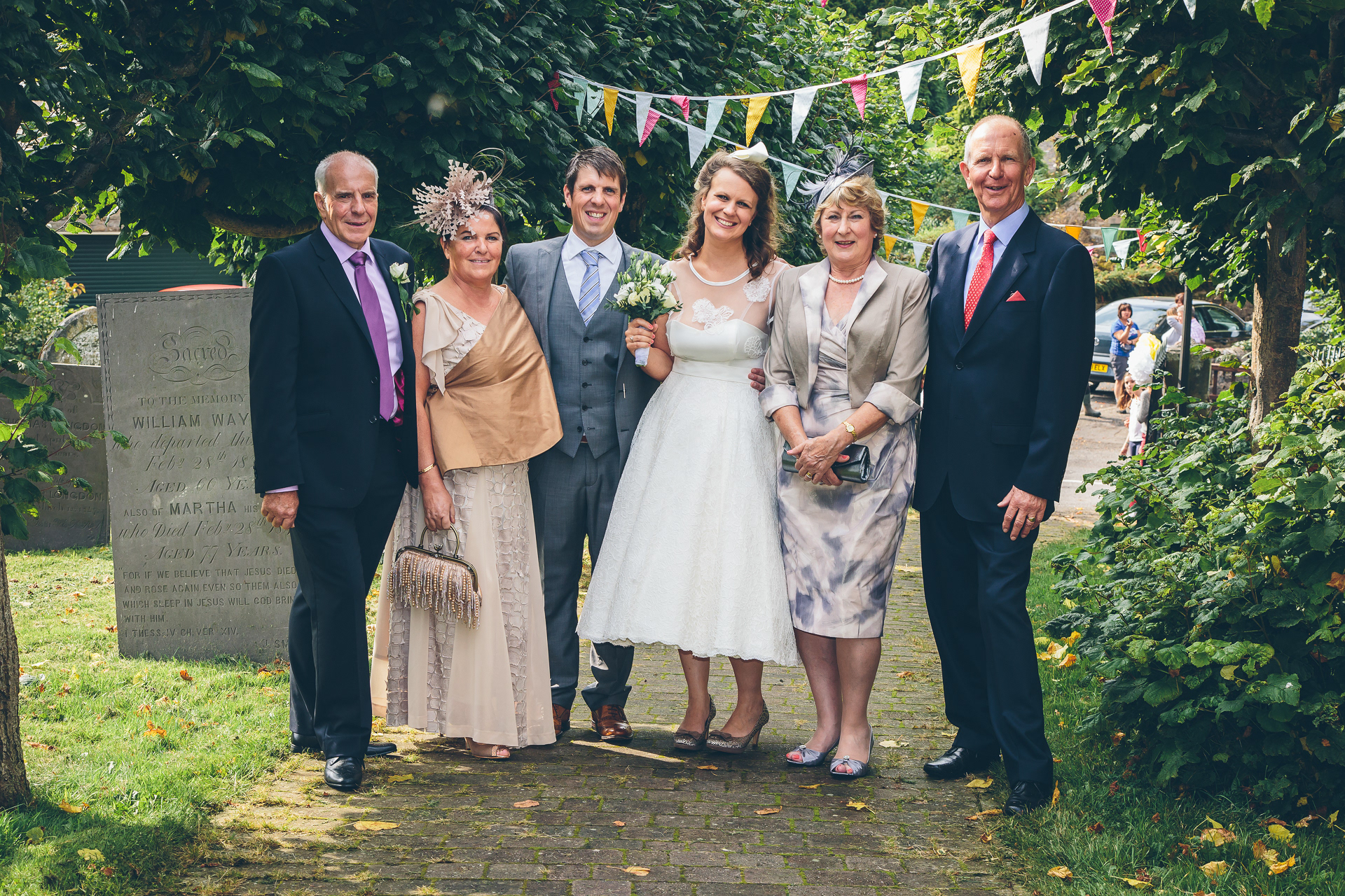 Bride and groom with family at a wedding in Derbyshire