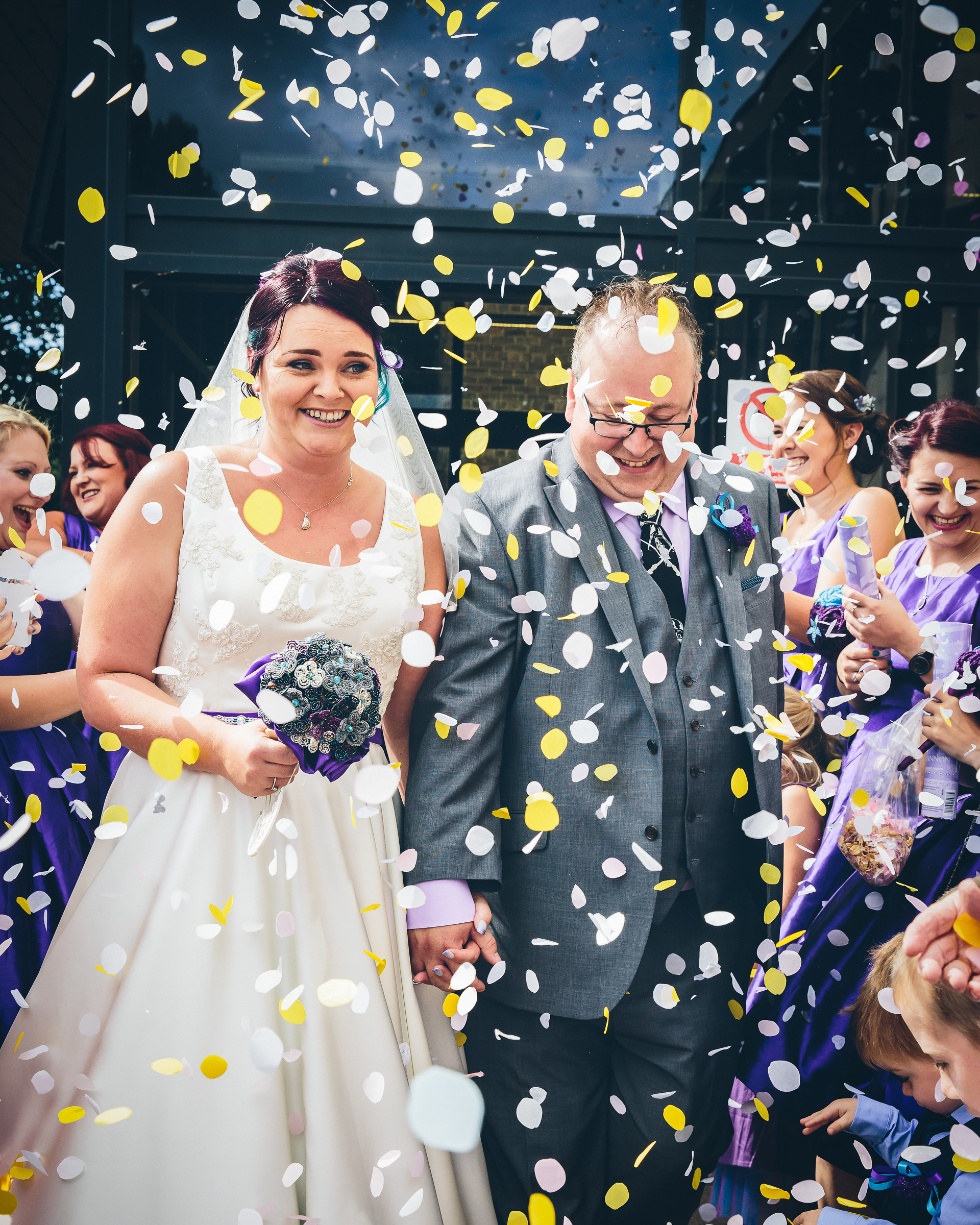 Bride and Groom with confetti at a wedding in Lincolnshire