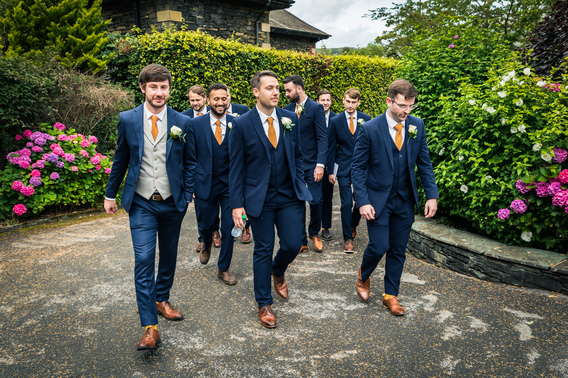 Groom and groomsmen arriving at church in Ambleside, Cumbria