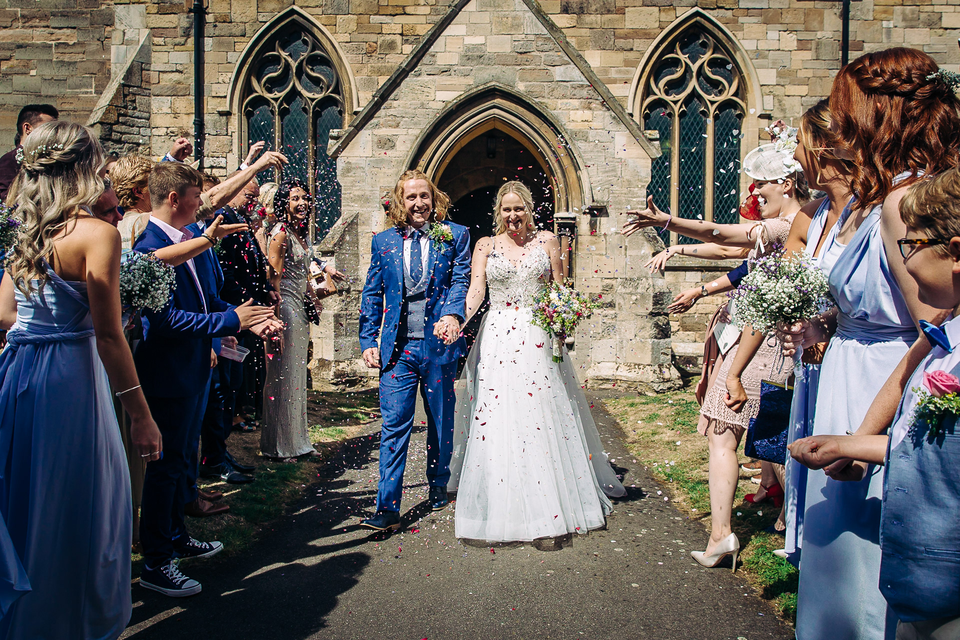 bride and groom with confetti