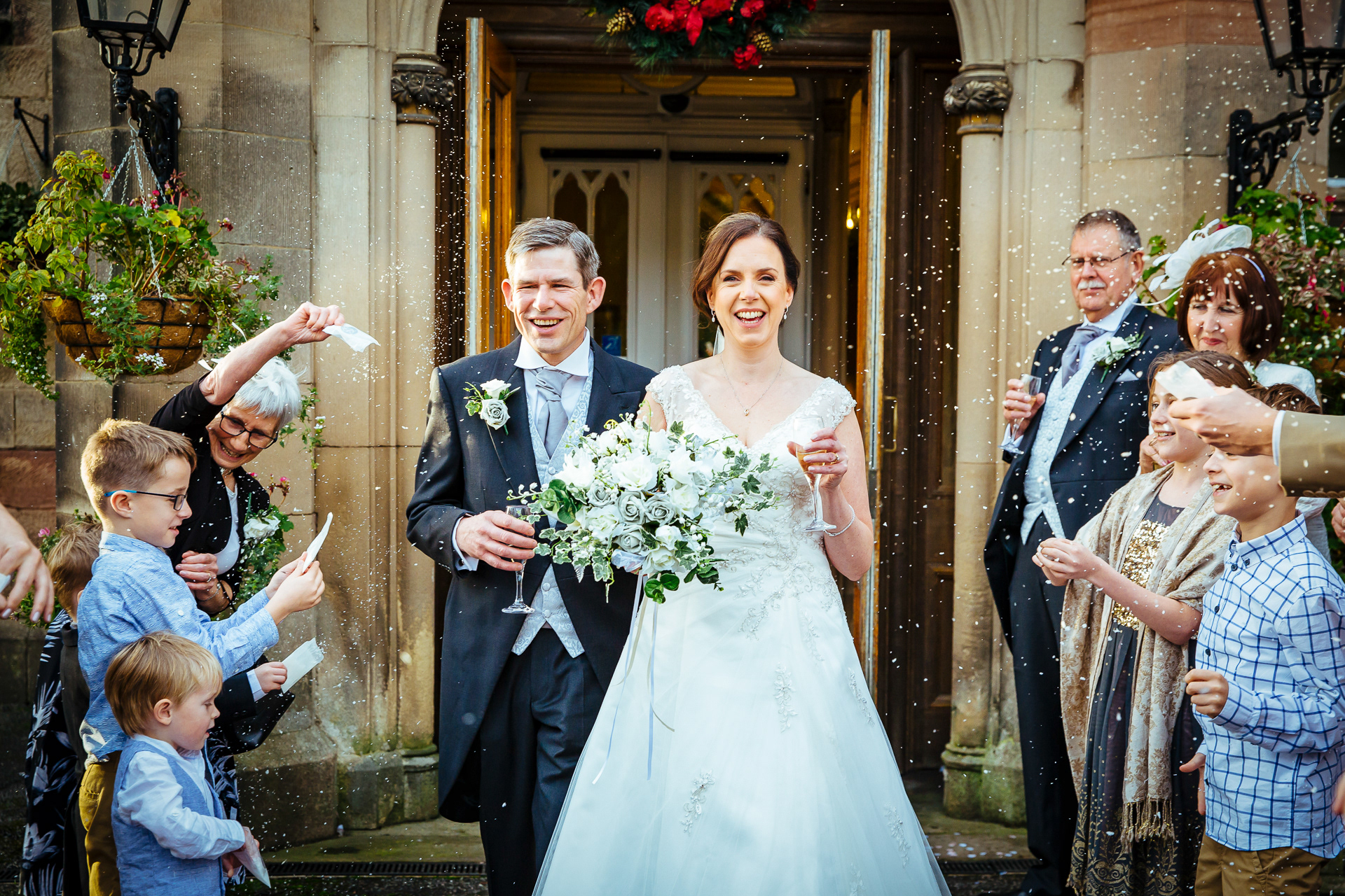 Bride and Groom with confetti at a wedding in Derbyshire