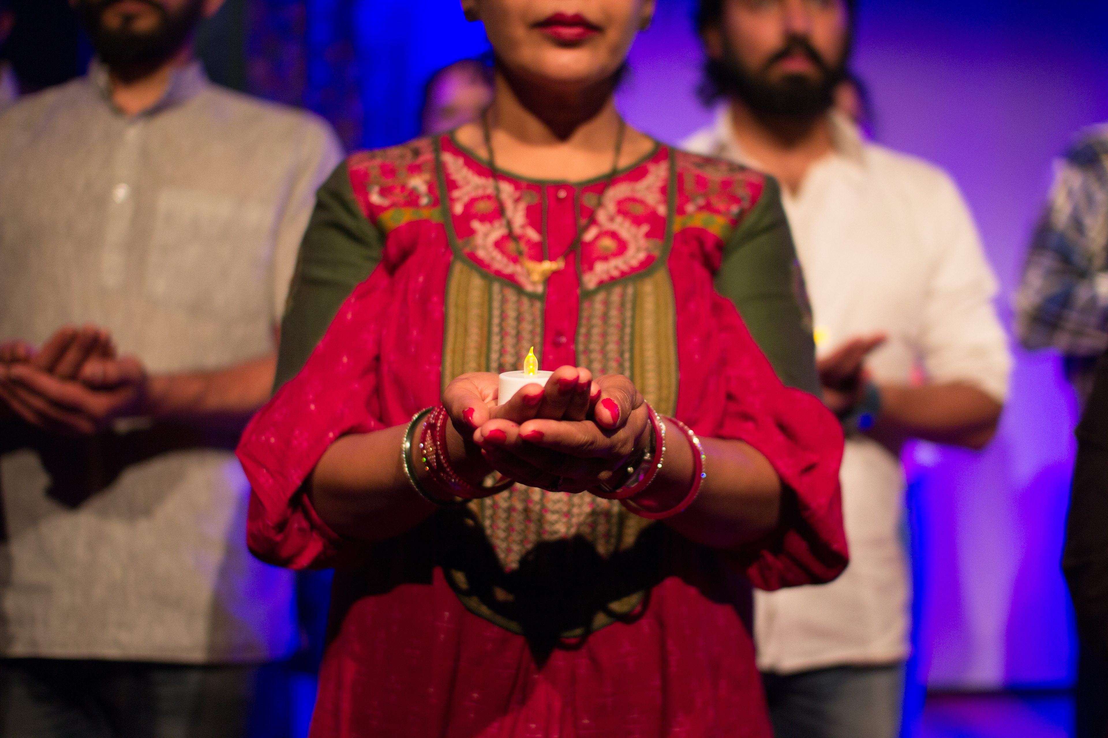 Sudeepta Vyas holding an eletric diya during the closing scene, photo by Ankita Singh 2018