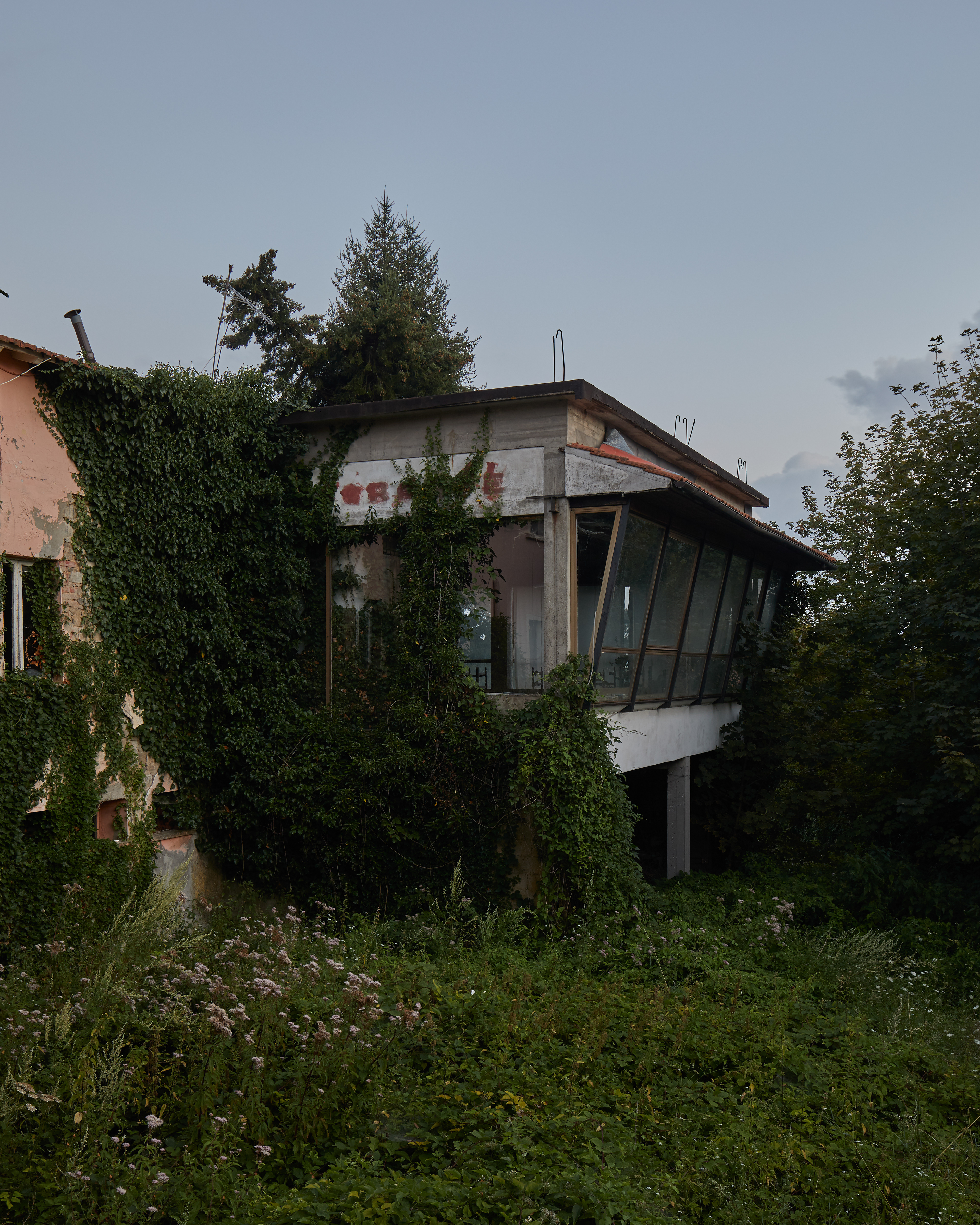 Hotel and restaurant in a neglected condition.
