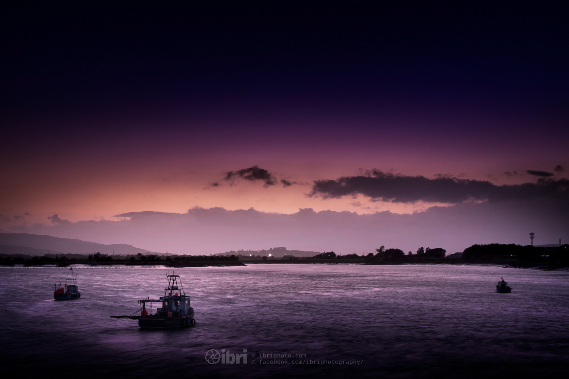 Clouds dampen the sunset colours over Stirling, taken from the old harbour in Alloa, Clackmannanshire.