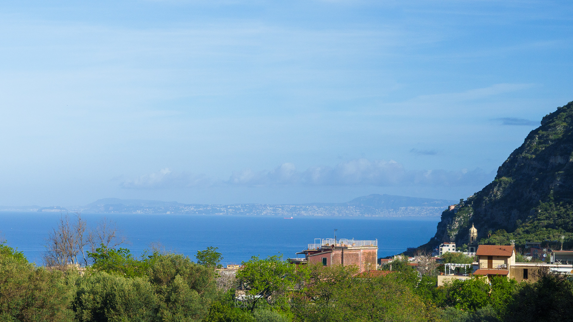 Destination somewhere in the haze over the Bay of Naples
