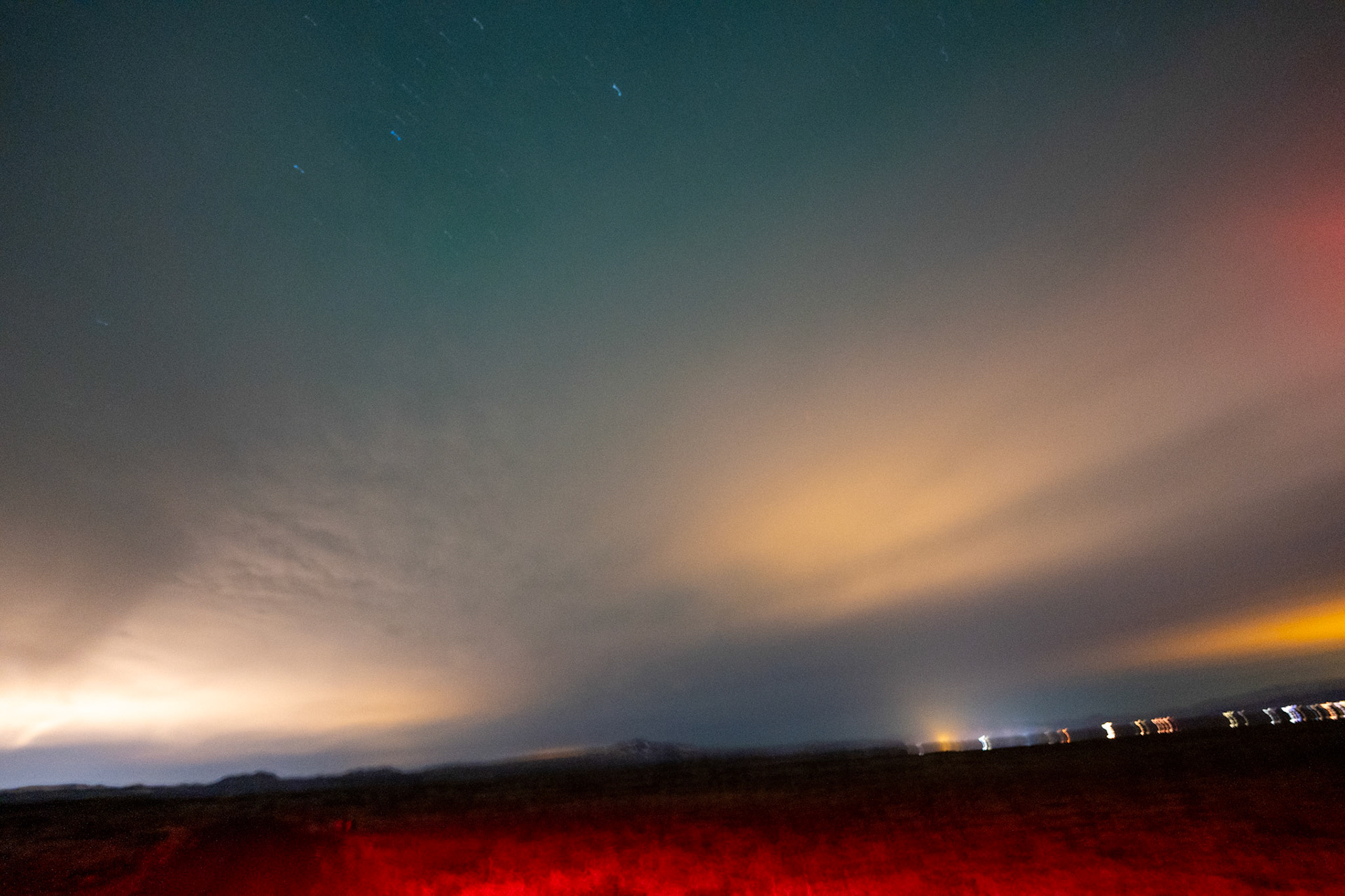 Aurora through clouds, handheld