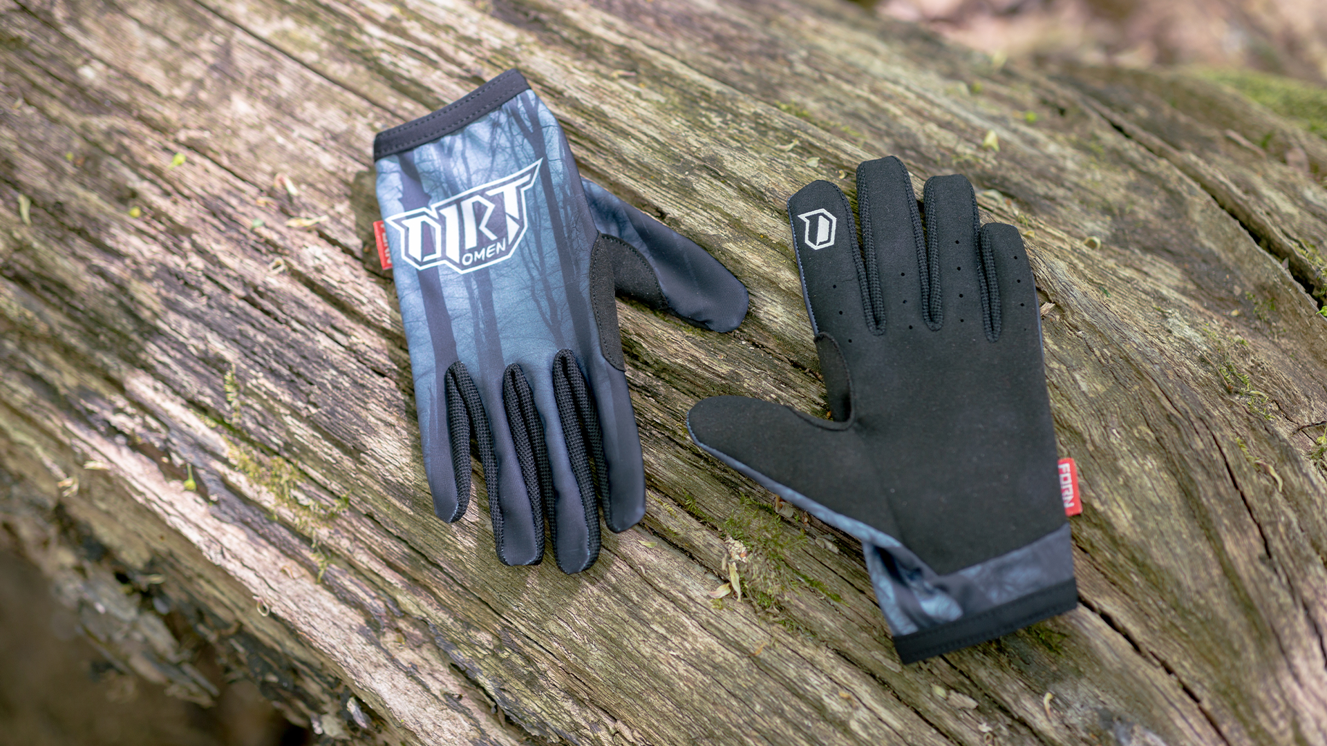 Dirt Omen bike gloves with dark forrest texture and logo