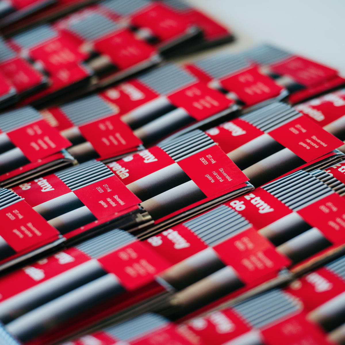The photo of printed brochures for TEDxBratislava 2023 Visual Identity