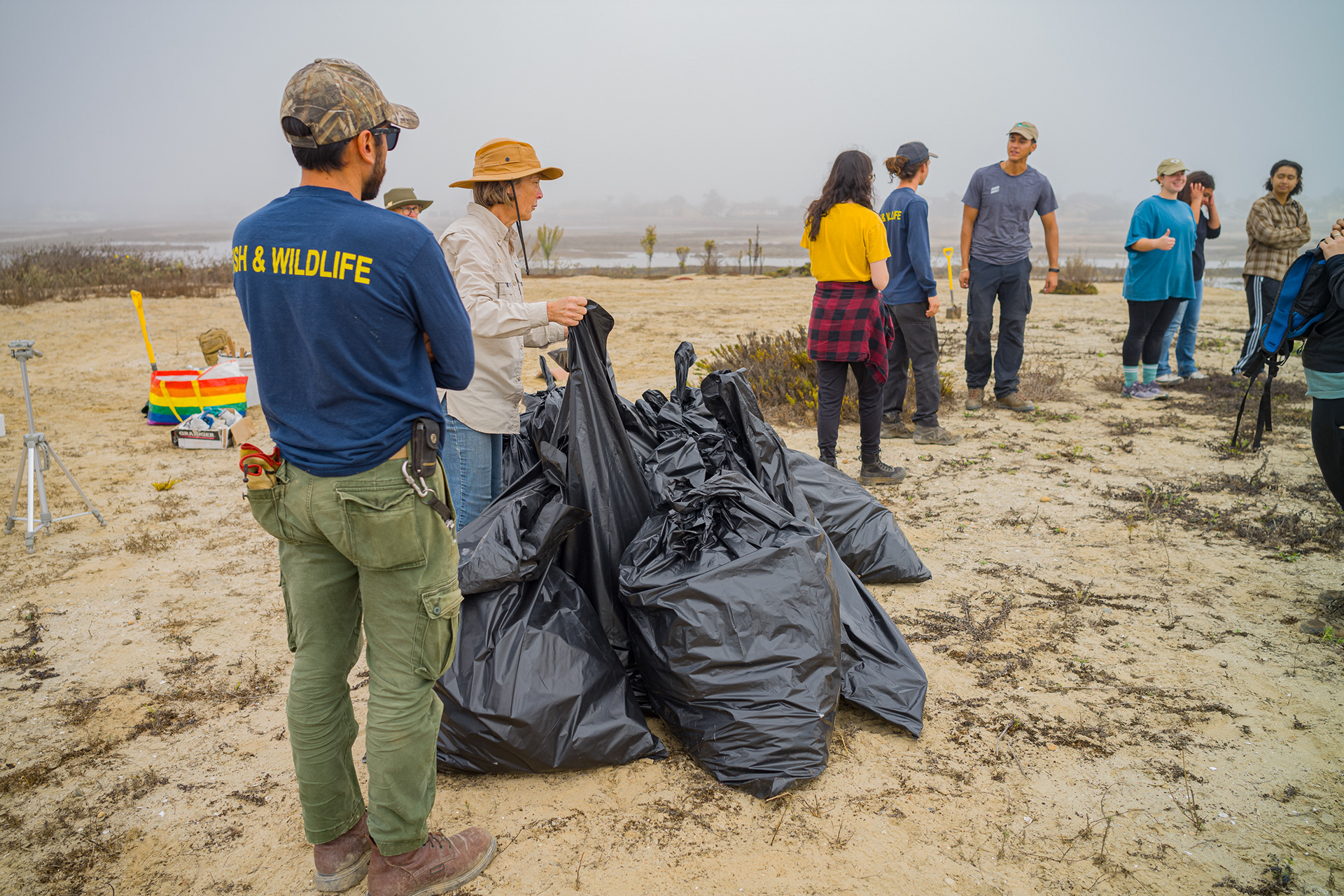 At the end of the event there was a count of how many bags they had accumulated. And there would be a group photo of the volunteers.  Photo Credit: Justin Enriquez