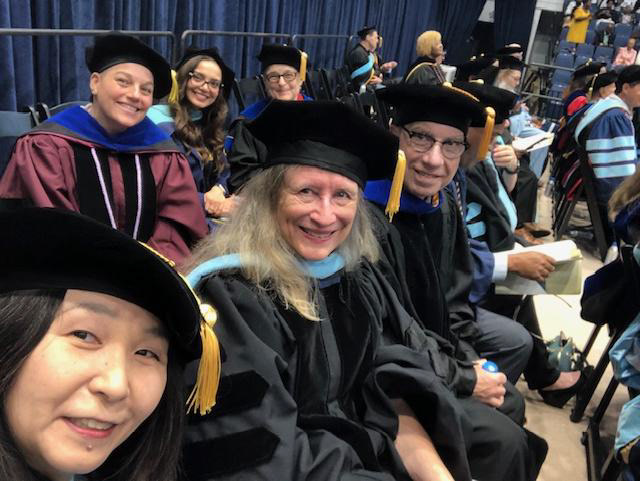 Faculty on Stage Graduation 2025