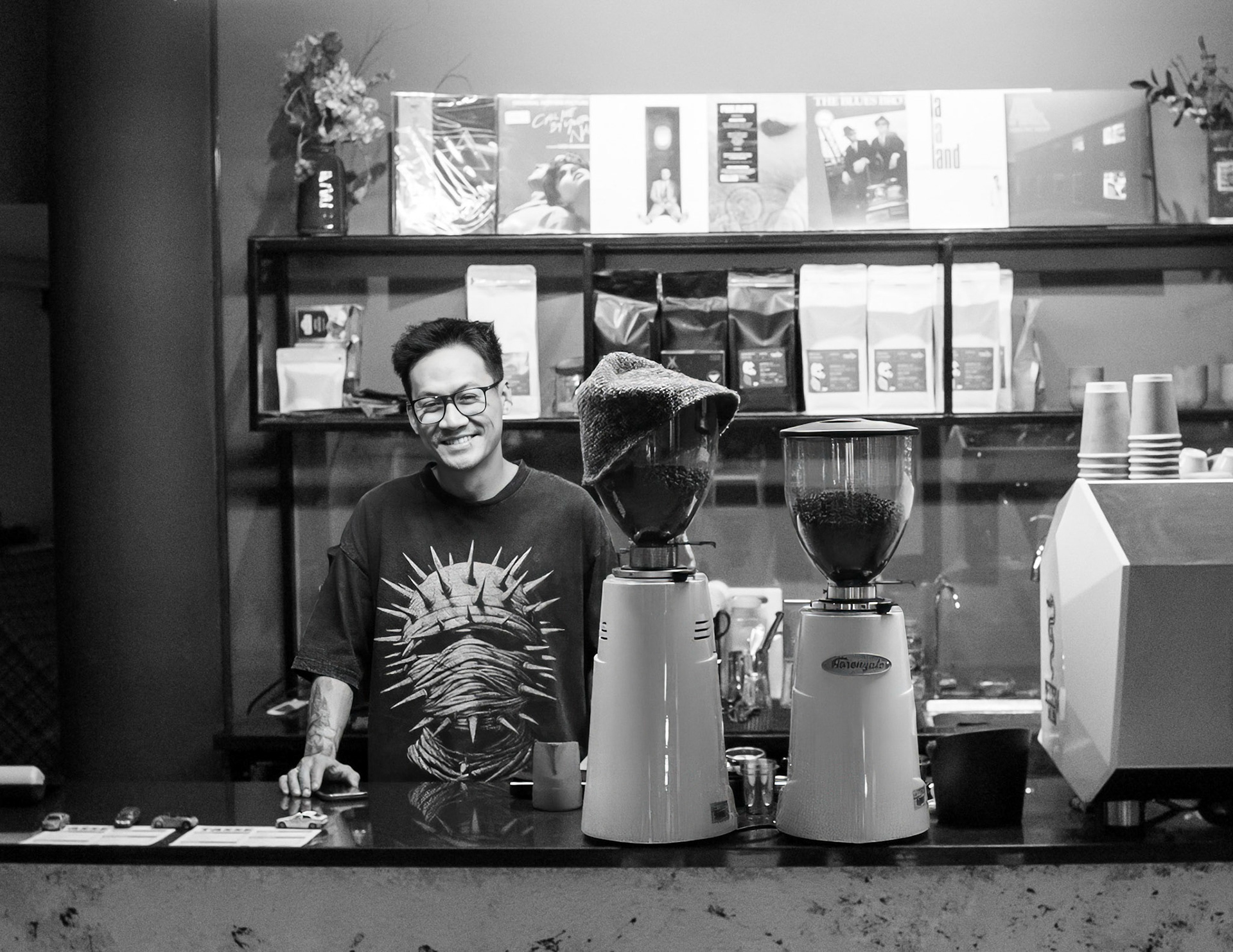 Minh in his cafe. Best espresso.
