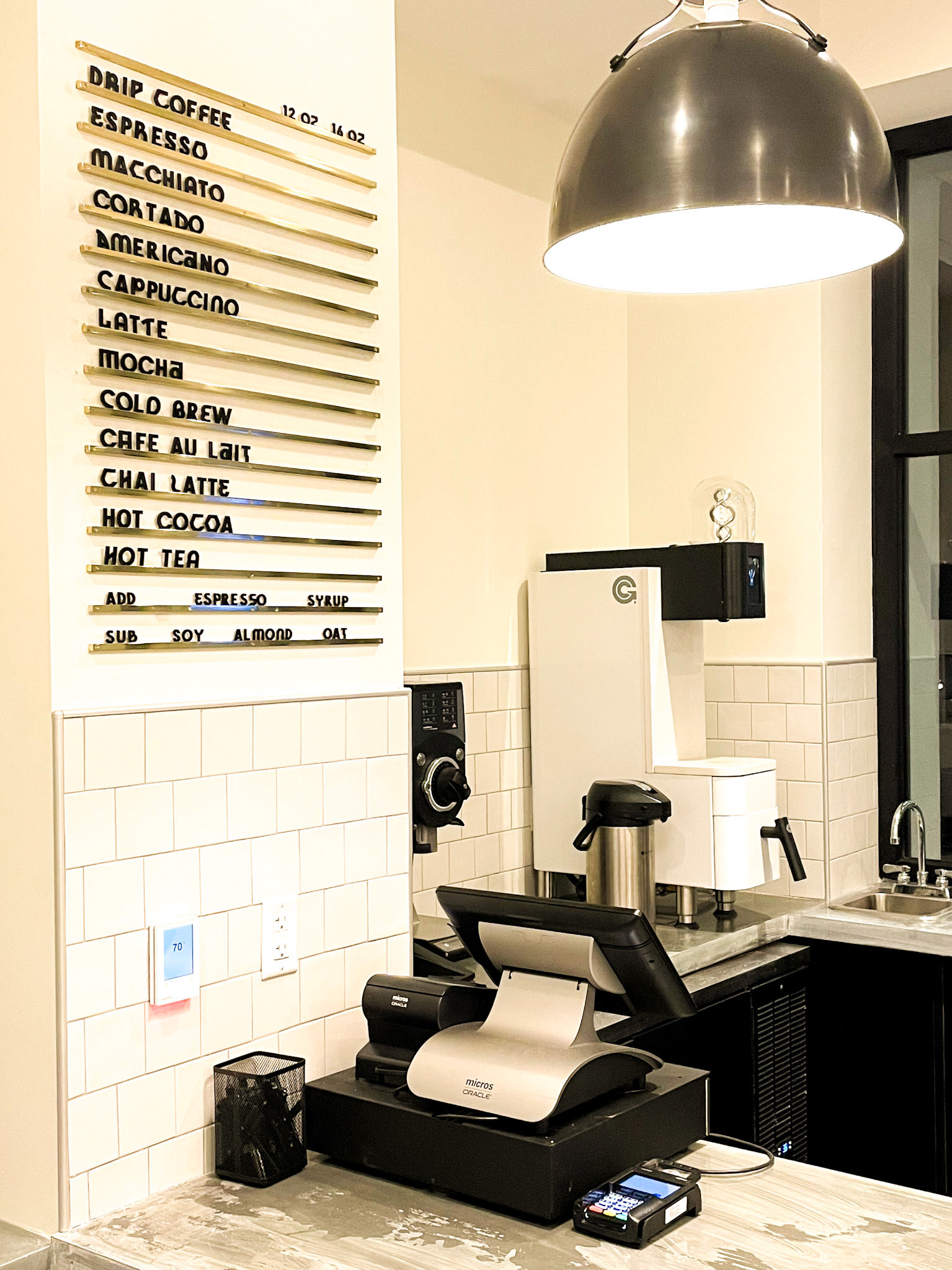 brass and acrylic coffee menu