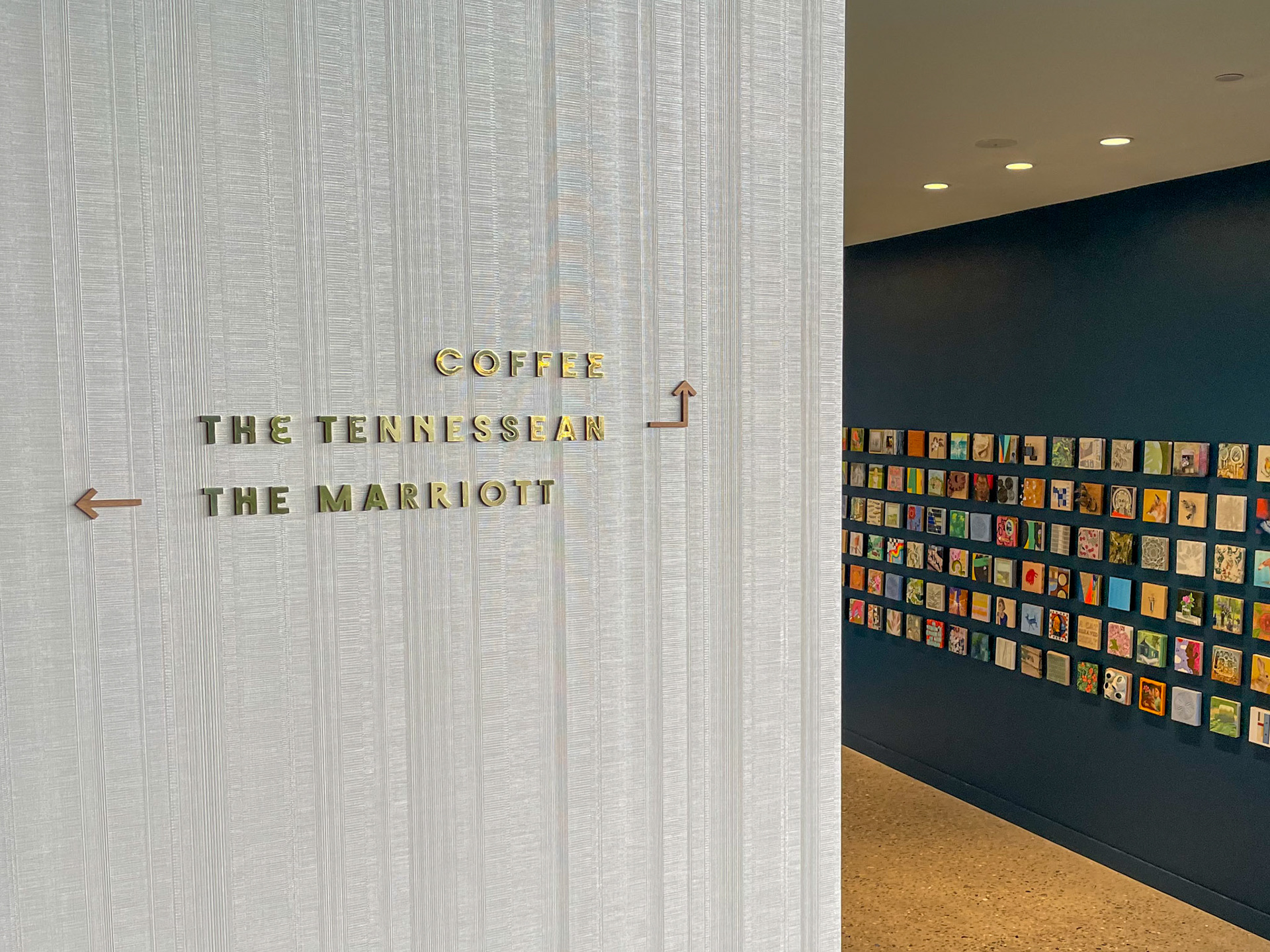 solid brass and white oak wayfinding