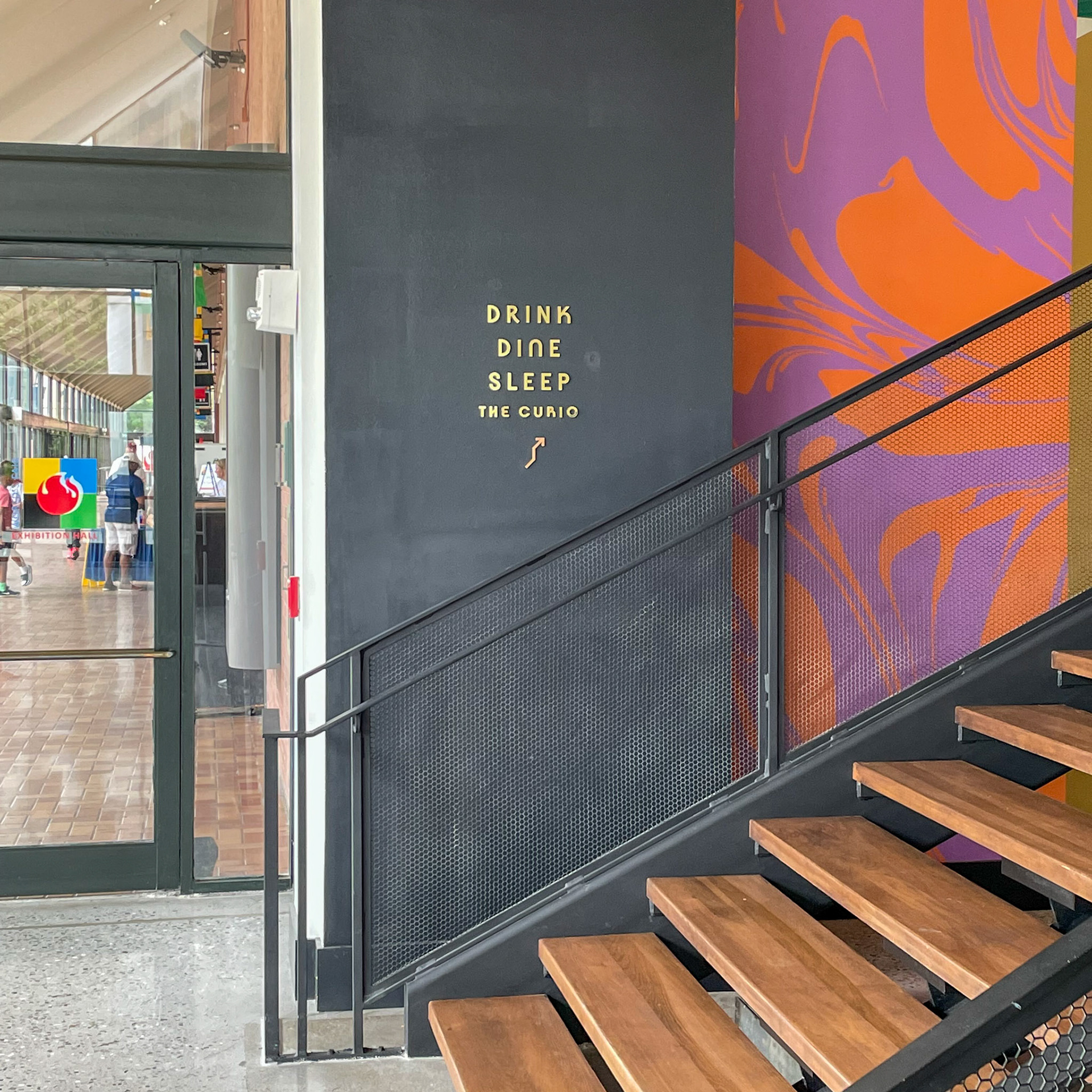 solid brass and white oak wayfinding