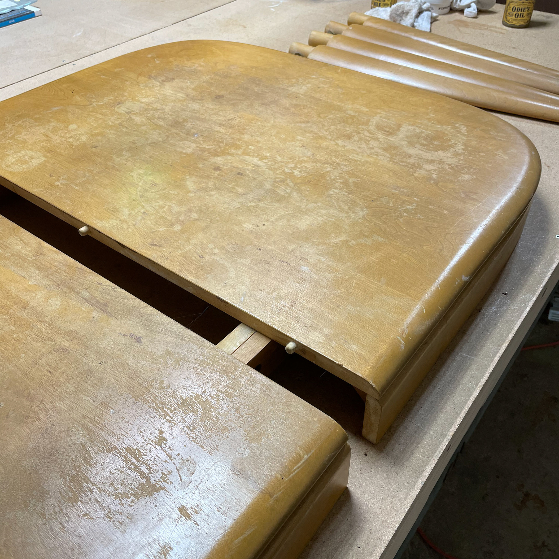 hard maple dining table with lots of wear