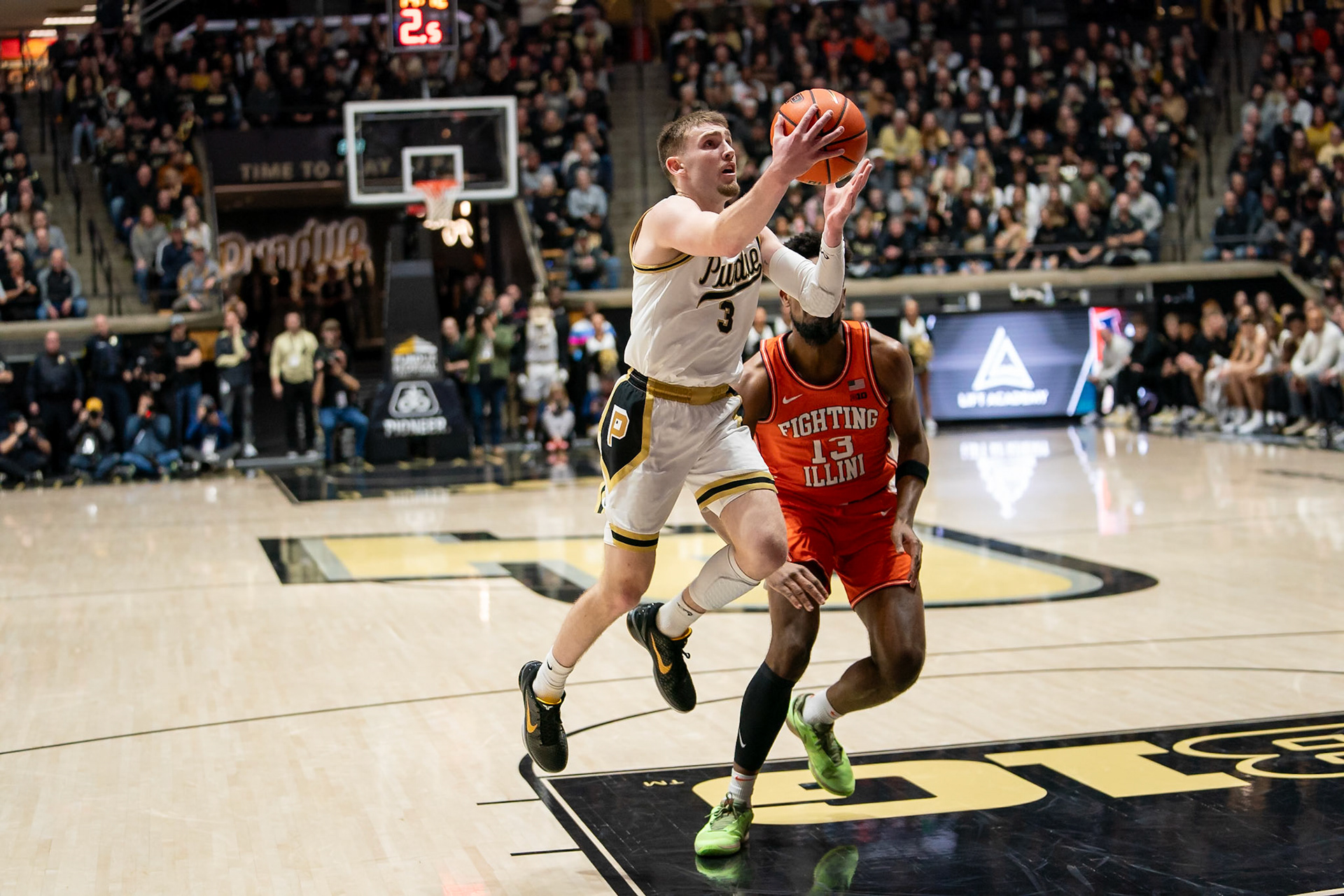 WEST LAFAYETTE, IN - JANUARY 5, 2024: Purdue Sophomore Guard Braden Smith (3)driving for a layup while Illinois Graduate Guard/Forward Quincy Guerrier (13) watches in Purdue Boilermaker's Basketball vs the Illinois Fighting Illini at Mackey Arena(Photo by Steve Bowen / Bowen Arrow Photography / Northern Indiana Sports Report)