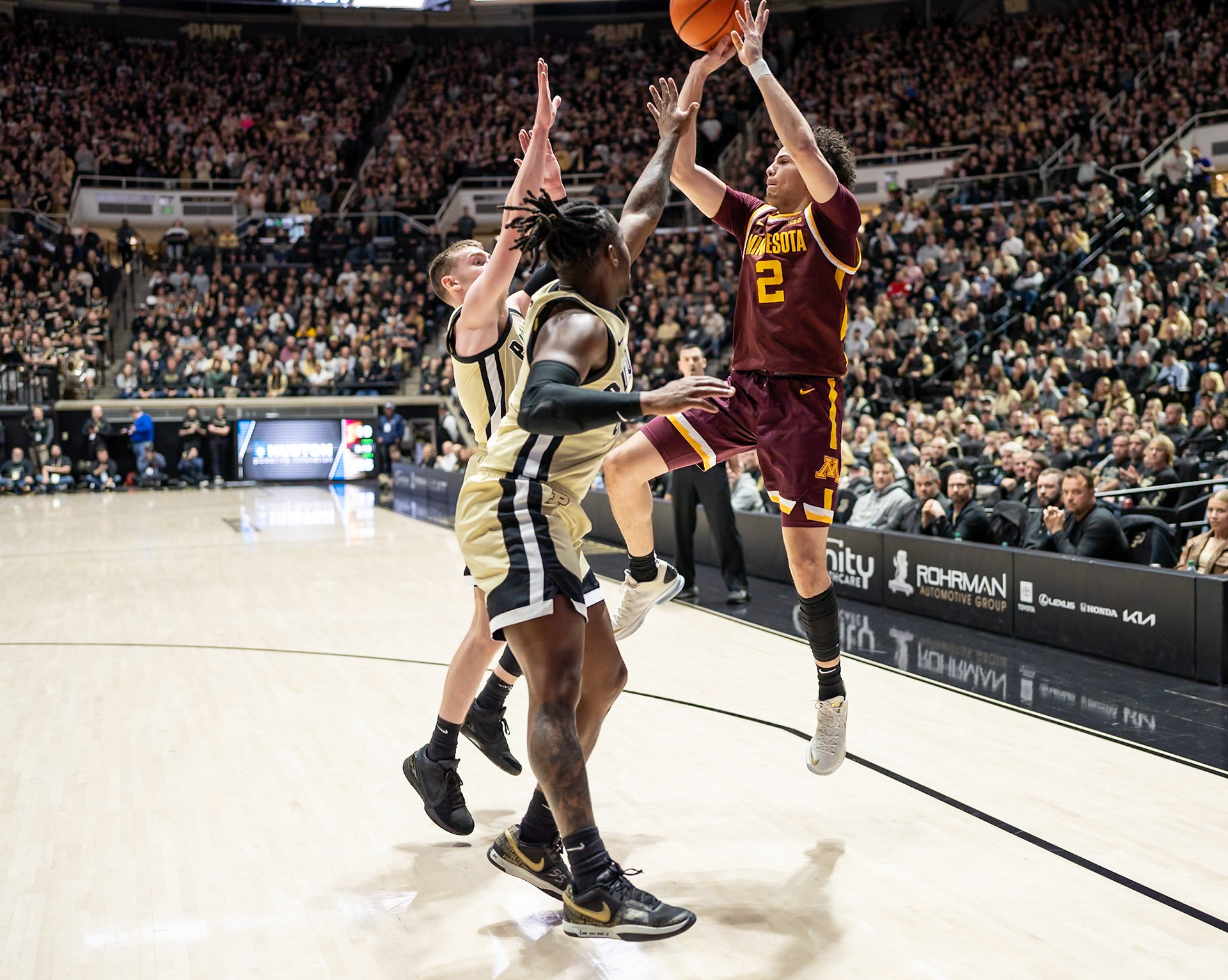 WEST LAFAYETTE, IN - FEBRUARY 15, 2024: Minnesota Junior Guard Mike Mitchell Jr. (2), Purdue Sophomore Guard Braden Smith (3), Purdue 5th year Guard Lance Jones (55) in Purdue Boilermakers Men's Basketball vs the Minnesota Golden Gophers at Mackey Arena(Photo by Steve Bowen / Bowen Arrow Photography / Northern Indiana Sports Report)