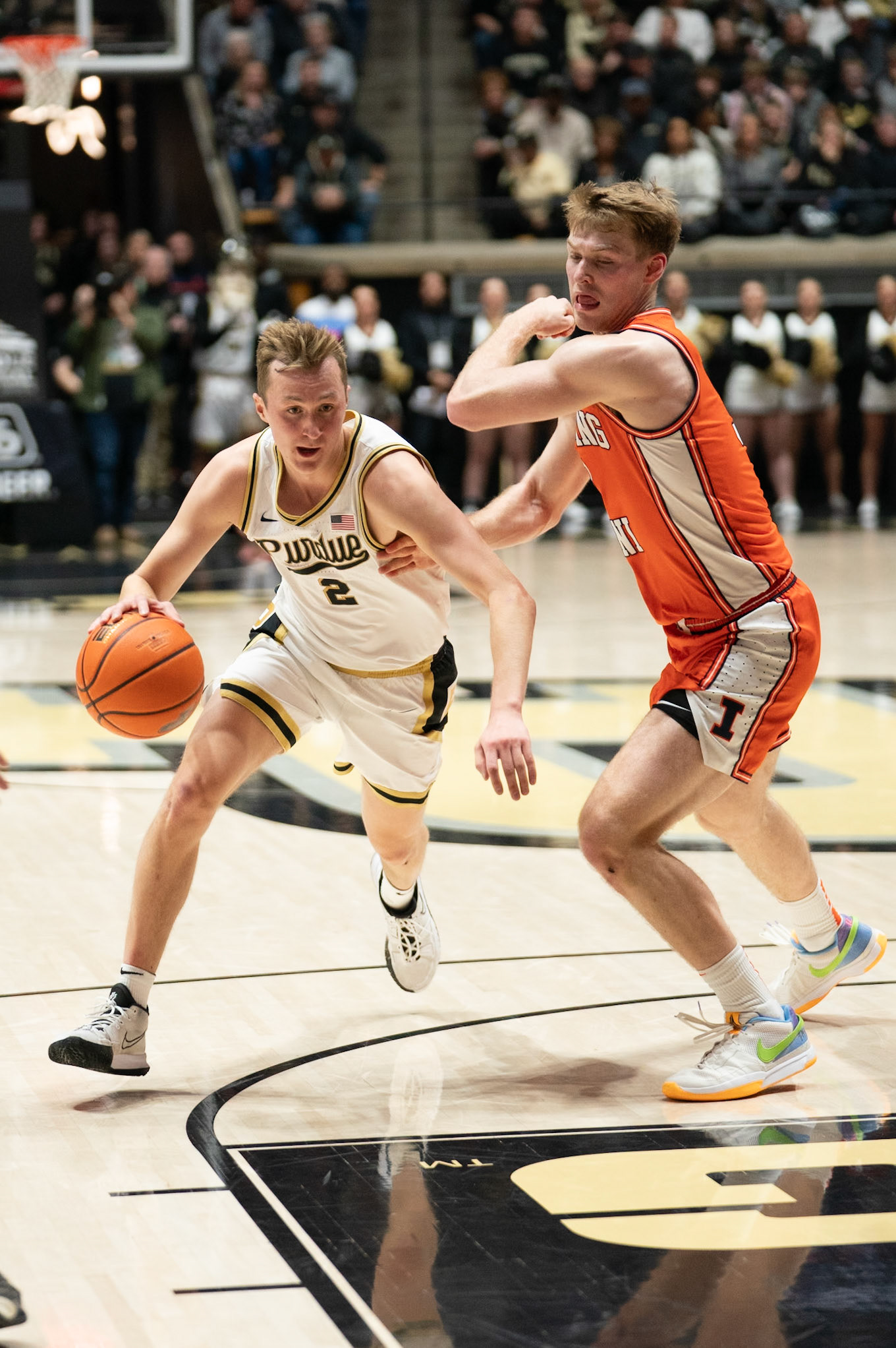 WEST LAFAYETTE, IN - JANUARY 5, 2024: Purdue Sophomore Guard Fletcher Loyer (2) driving past Illinois Graduate Guard/Forward Marcus Domask (3) in Purdue Boilermaker's Basketball vs the Illinois Fighting Illini at Mackey Arena(Photo by Steve Bowen / Bowen Arrow Photography / Northern Indiana Sports Report)