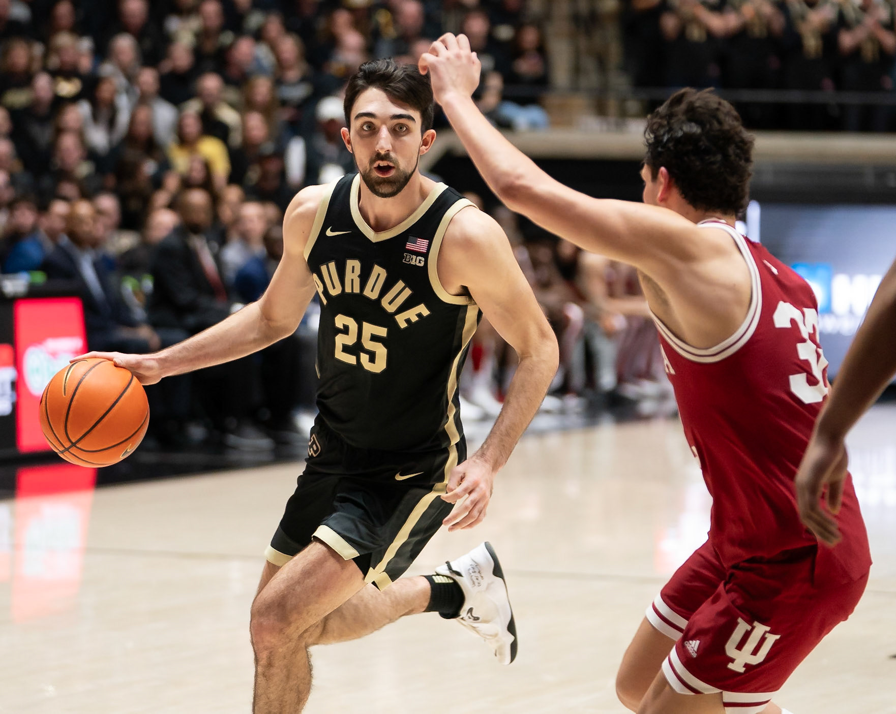 WEST LAFAYETTE, IN - FEBRUARY 10, 2024: Purdue Senior Guard Ethan Morton (25), Indiana Senior Guard Trey Galloway (32) in Purdue Boilermaker vs Indiana Hoosiers Basketball at Mackey Arena(Photo by Steve Bowen / Bowen Arrow Photography / Northern Indiana Sports Report)