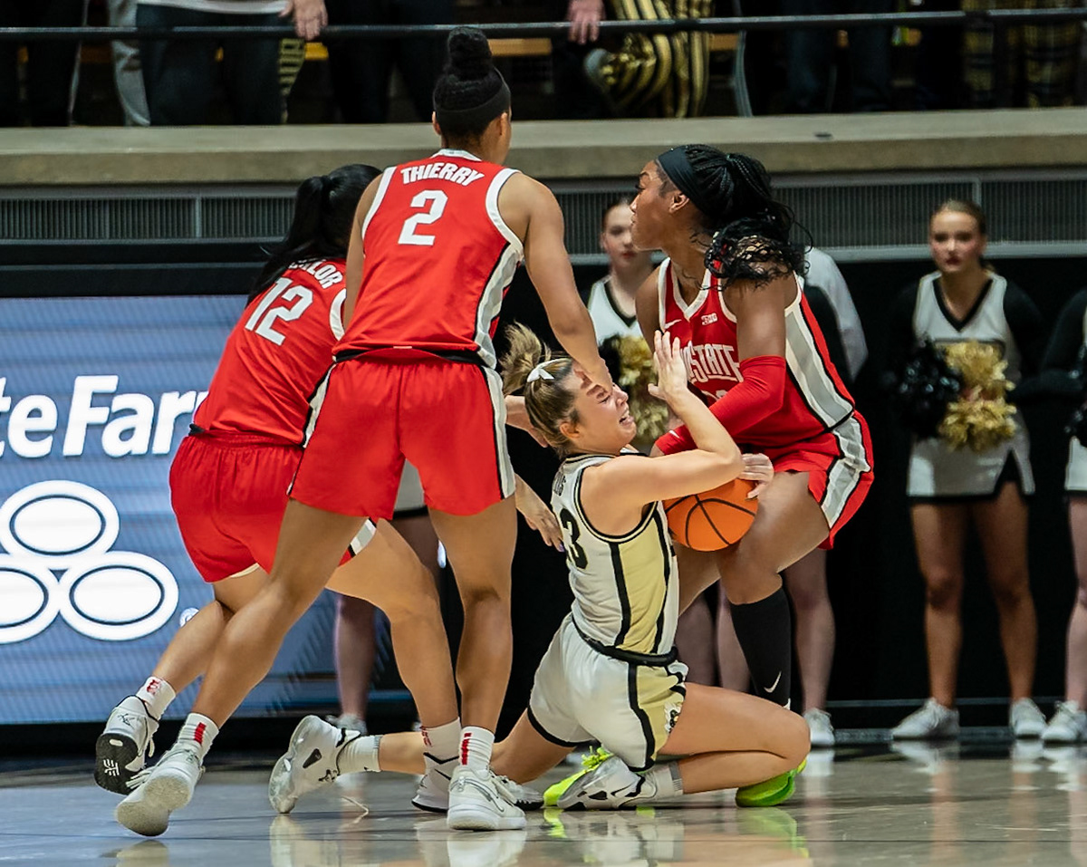 WEST LAFAYETTE, IN - JANUARY 28, 2024: Purdue 5th Year Guard Abbey Ellis (23), Ohio State Guard Graduate Celeste Taylor (12), Ohio State Guard/Forward Junior Taylor Thierry (2), Ohio State Forward Sophomore Cotie McMahon (32) competing in Purdue Boilermaker Women's Basketball versus the Ohio State Buckeyes at Mackey Arena(Photo by Steve Bowen / Bowen Arrow Photography / Northern Indiana Sports Report)