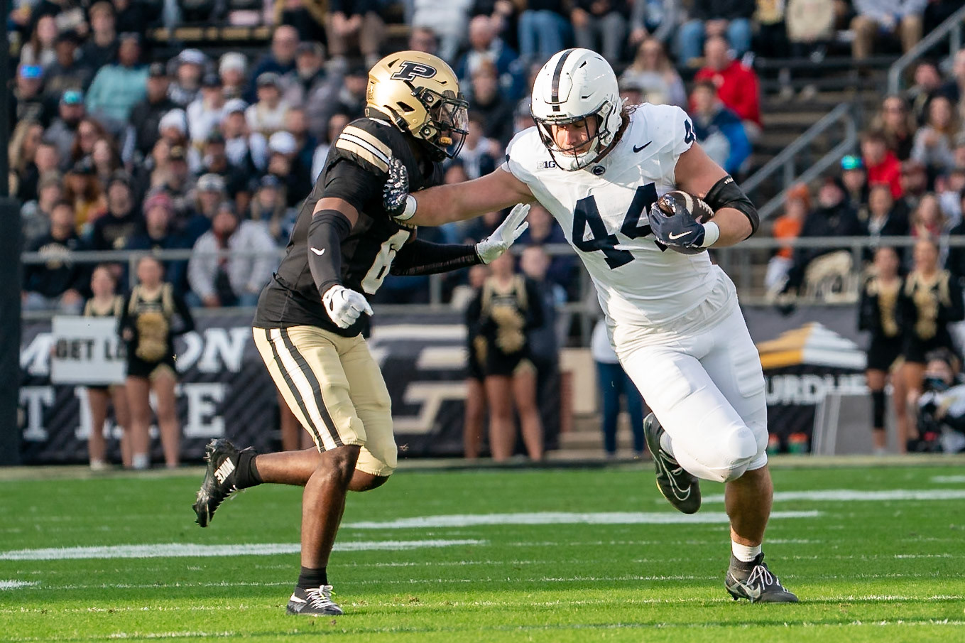WEST LAFAYETTE, IN - NOVEMBER 16, 2024: Penn State University Senior Tight End Tyler Warren (44) runs with the ball as Purdue University Freshman Defensive Back Smiley Bradford (6) tryes to tackle him in the Purdue University Boilermakers vs Penn State University Nittany Lions Football game at Ross-Ade Stadium(Photo by Steve Bowen / Bowen Arrow Photography / Northern Indiana Sports Report)