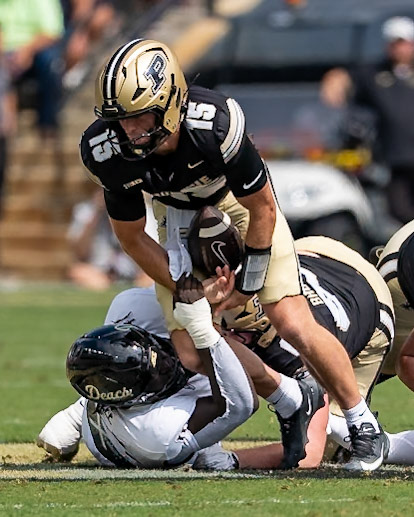 WEST LAFAYETTE, IN - SEPTEMBER 12, 2026: Purdue University Quarterback Ryan Browne (15) getting sacked by Wake Forest University Defensive Lineman Kadear Dembele (55) and barely holding onto the ball during the Purdue Boilermakers football game vs the Wake Forest Demon Deacons at Ross-Ade Stadium(Photo by Steve Bowen / Northern Indiana Sports Report)