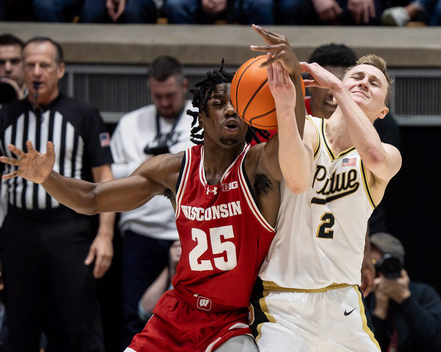WEST LAFAYETTE, IN - MARCH 10, 2024: Purdue Sophomore Guard Fletcher Loyer (2), Wisconsin Freshman Guard John Blackwell (25) competing in Purdue University Boilermaker Basketball vs University of Wisconsin Badgers at Mackey Arena(Photo by Steve Bowen / Bowen Arrow Photography / Northern Indiana Sports Report)