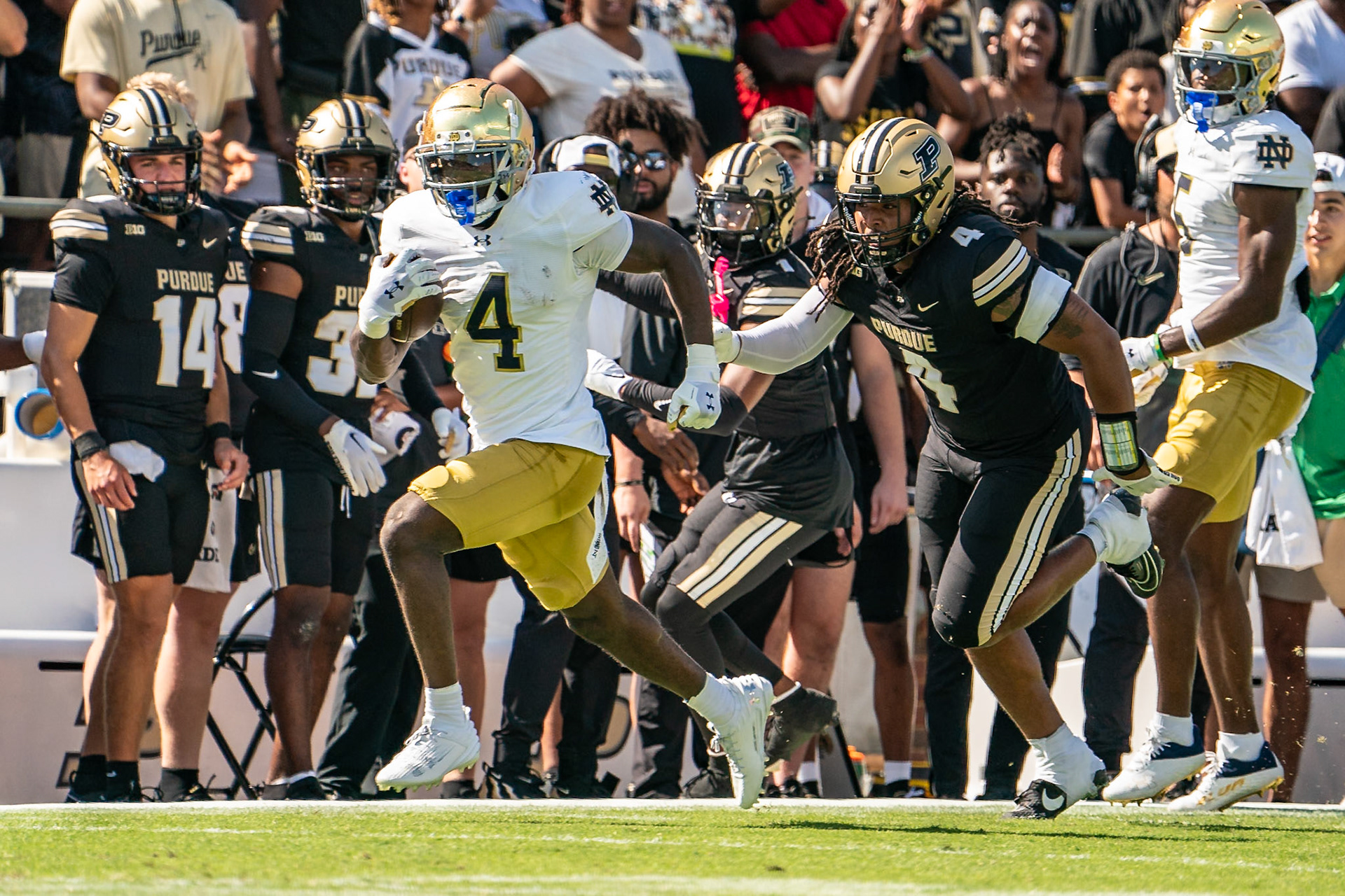 WEST LAFAYETTE, IN - SEPTEMBER 14, 2024: Notre Dame Sophomore RB Jeremiyah Love (4), Purdue Sr. Linebacker Kydran Jenkins (4) during the Purdue University Boilermakers vs Notre Dame Fighting Irish Football game at Ross-Ade Stadium(Photo by Steve Bowen / Bowen Arrow Photography / Northern Indiana Sports Report)