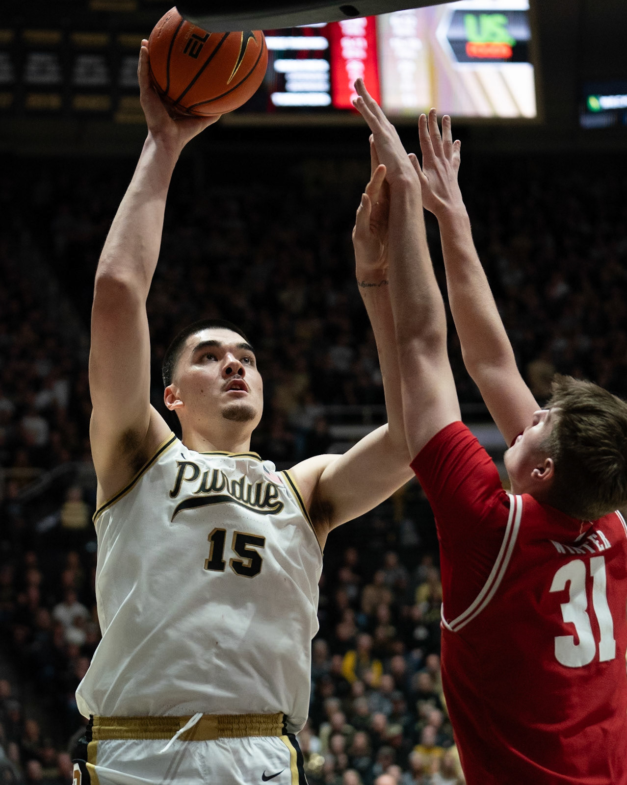 WEST LAFAYETTE, IN - MARCH 10, 2024: Purdue Senior Center Zach Edey (15), Wisconsin Freshman Forward Nolan Winter (31) in Purdue University Boilermaker Basketball vs University of Wisconsin Badgers at Mackey Arena(Photo by Steve Bowen / Bowen Arrow Photography / Northern Indiana Sports Report)