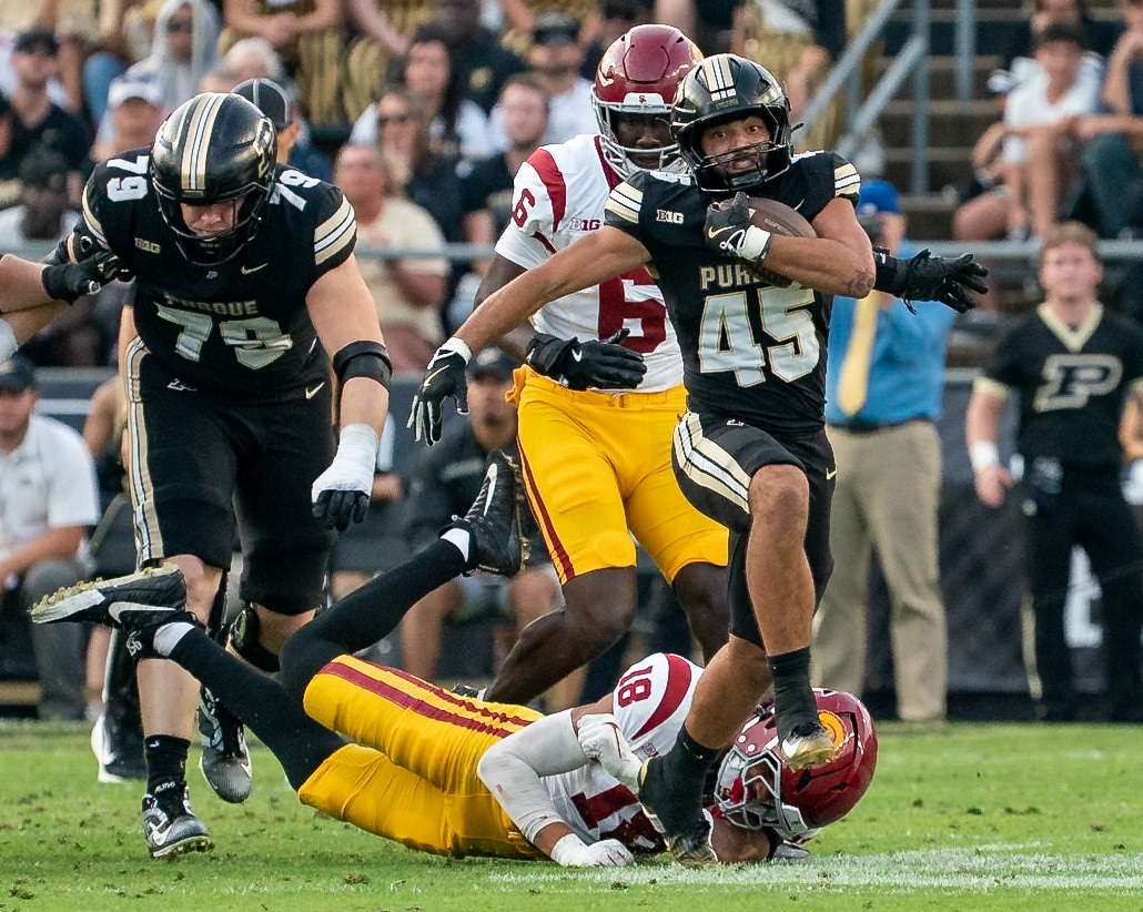 WEST LAFAYETTE, IN - SEPTEMBER 13, 2025: Purdue University Senior Running Back Devin Mockobee (45), USC Redshirt Senior LB Eric Gentry (18) in Purdue Boilermaker Football vs University of Southern California Trojans at Ross-Ade Stadium(Photo by Steve Bowen / Northern Indiana Sports Report)