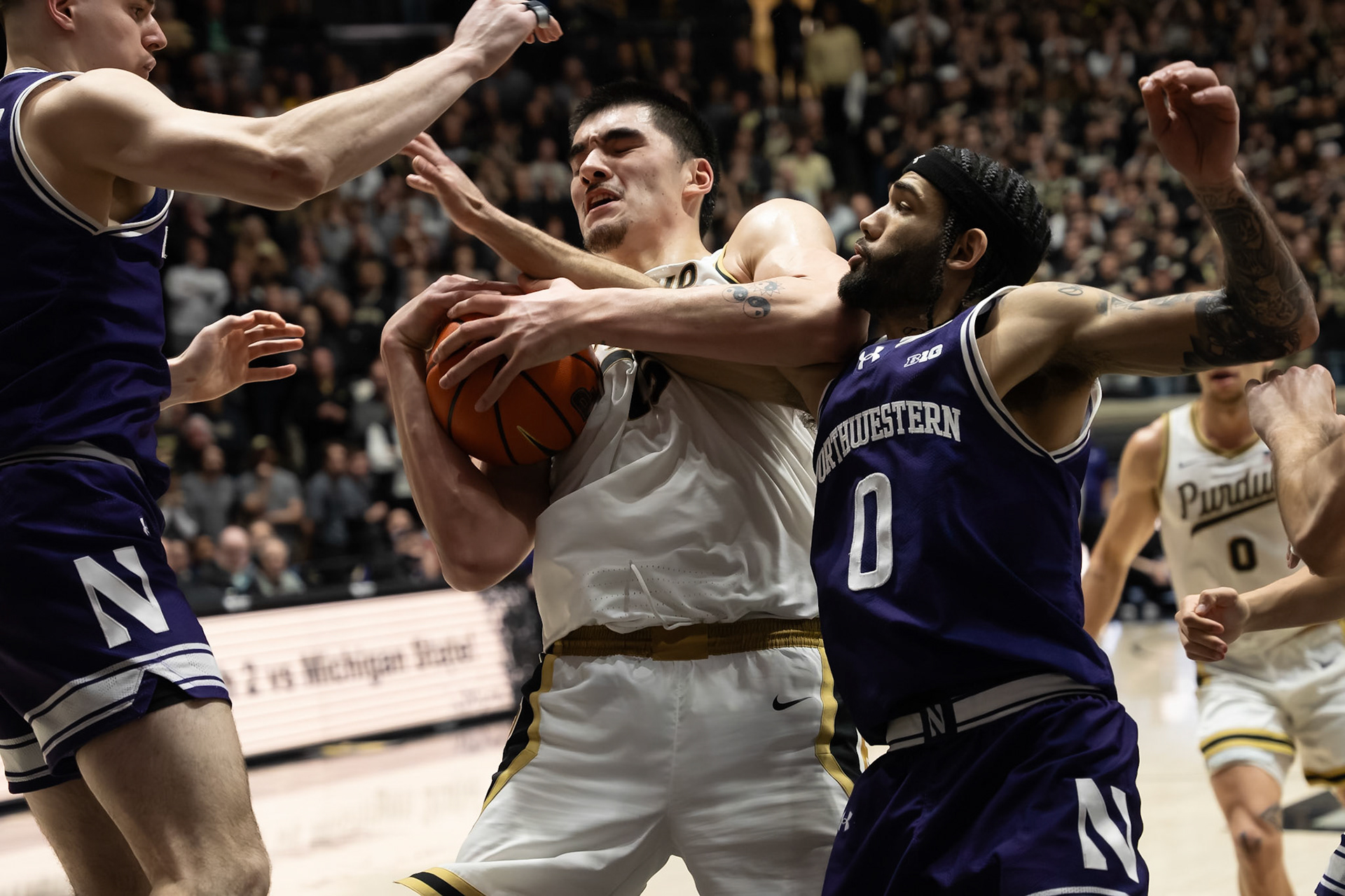 WEST LAFAYETTE, IN - JANUARY 31, 2024: Purdue Senior Center Zach Edey (15), Northwestern Graduate Guard Boo Buie (0) competing in Purdue Boilermakers Mens Basketball versus the Northwestern Wildcats at Mackey Arena(Photo by Steve Bowen / Bowen Arrow Photography / Northern Indiana Sports Report)