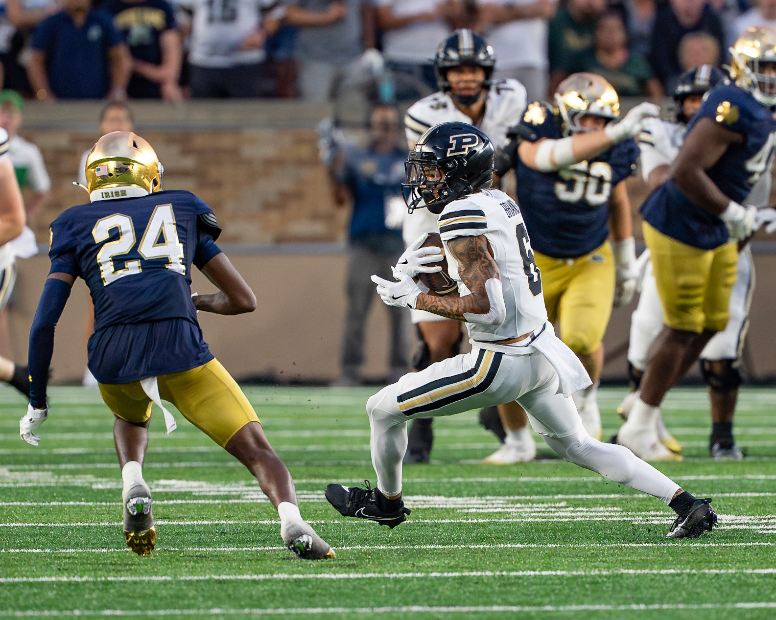 SOUTH BEND, IN - SEPTEMBER 20, 2025: Purdue University Sophomore Wide Receiver Arhmad Branch (6), running after a catch while being chased by Notre Dame University's Freshman CB Mark Zackery IV (24) in Purdue Boilermakers at Notre Dame Fighting Irish Football at Notre Dame Stadium(Photo by Steve Bowen / Northern Indiana Sports Report)