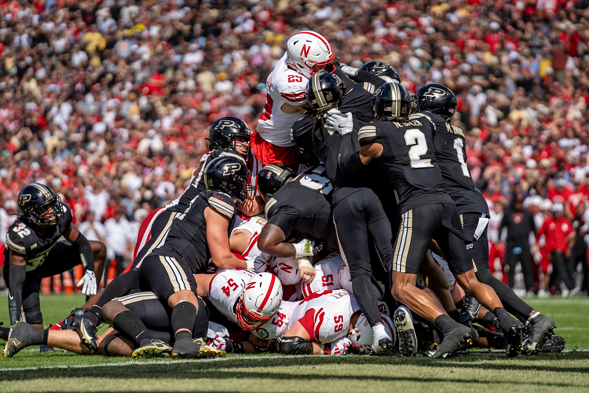 WEST LAFAYETTE, IN - SEPTEMBER 28, 2024: Nebraska University Sophomore Running Back Dante Dowdell (23), Purdue University Senior Linebacker Kydran Jenkins (4), Purdue University Junior Defensive Back Nyland Green (2), Purdue University Senior Defensive Back Markevious Brown (1), Purdue University Senior Defensive Lineman Cole Brevard (91), Purdue University Redshirt Freshman Linebacker Winston Berglund (20), Purdue University Sophomore Rush End Will Heldt (15) during the Purdue University Boilermakers vs Nebraska University Cornhuskers Football game at Ross-Ade Stadium(Photo by Steve Bowen / Bowen Arrow Photography / Northern Indiana Sports Report)