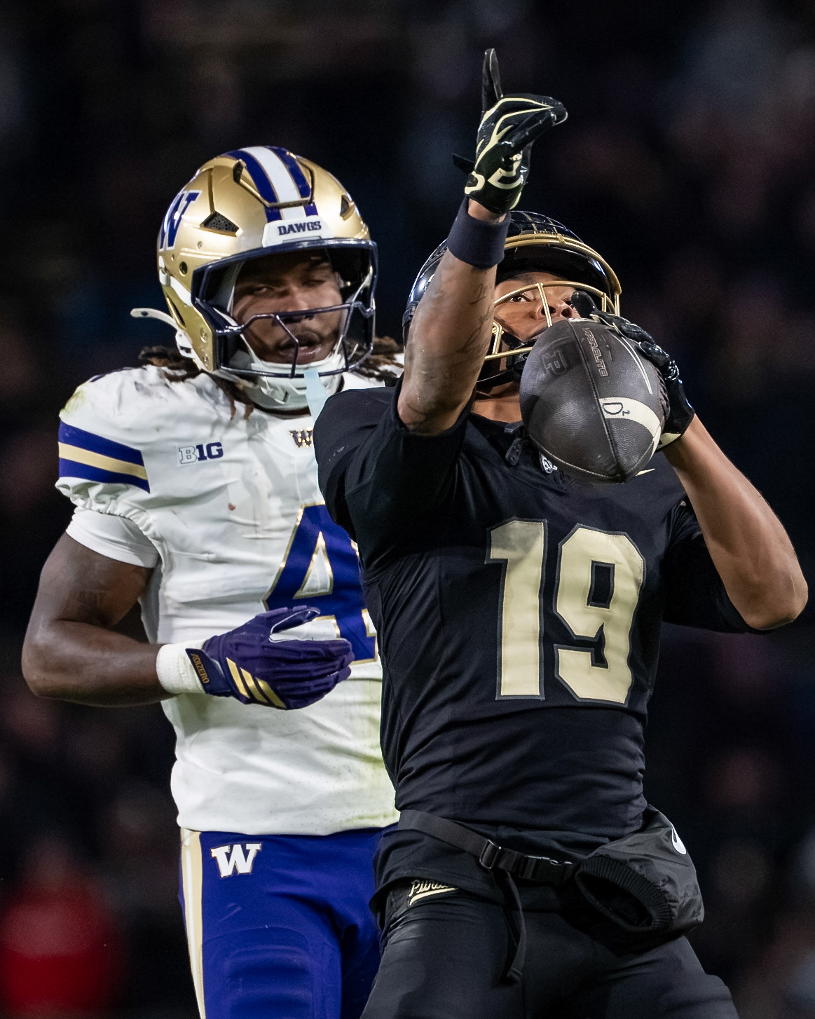WEST LAFAYETTE, IN - OCTOBER 16, 2026: Purdue University Sophomore Wide Receiver Asaad Waseem (19), University of Washington S Rylon Dillard-Allen (4) during the Purdue Boilermakers vs Washington Huskies football game at Ross-Ade Stadium(Photo by Steve Bowen / Northern Indiana Sports Report)